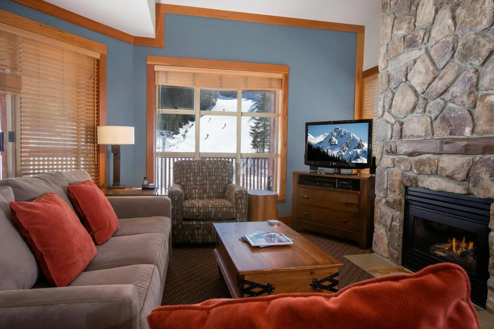 Living room in Legends Whistler, by Lodging Ovations