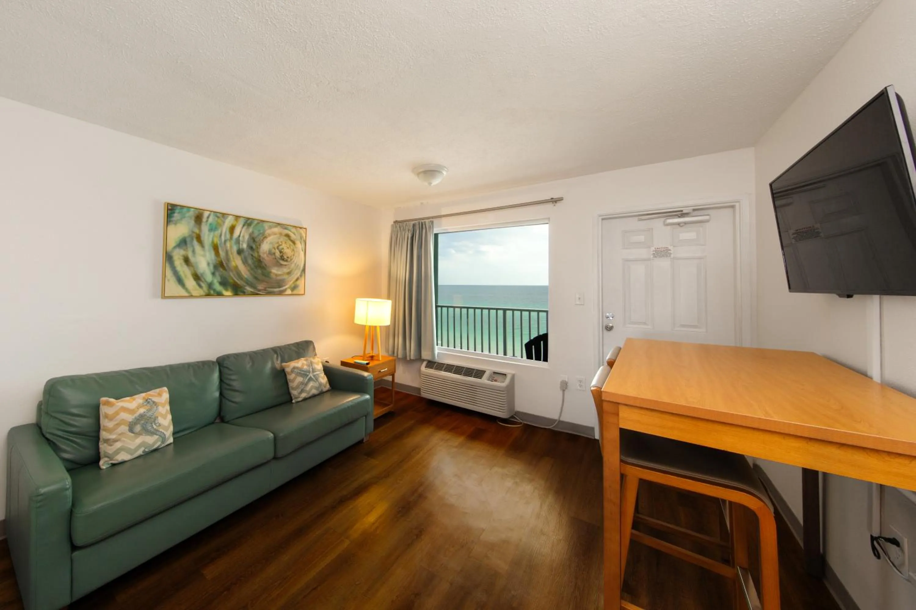 Living room in Beachcomber Beachfront Hotel, a By The Sea Resort