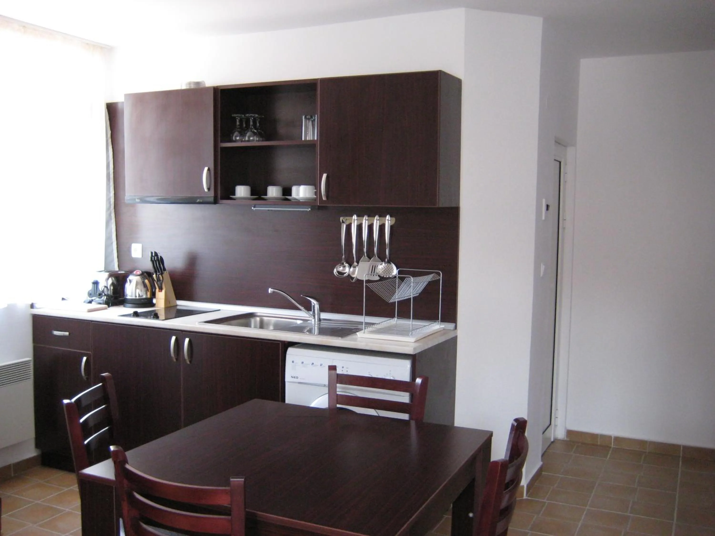 Kitchen or kitchenette in Apartments Four Leaf Clover Bansko to rent