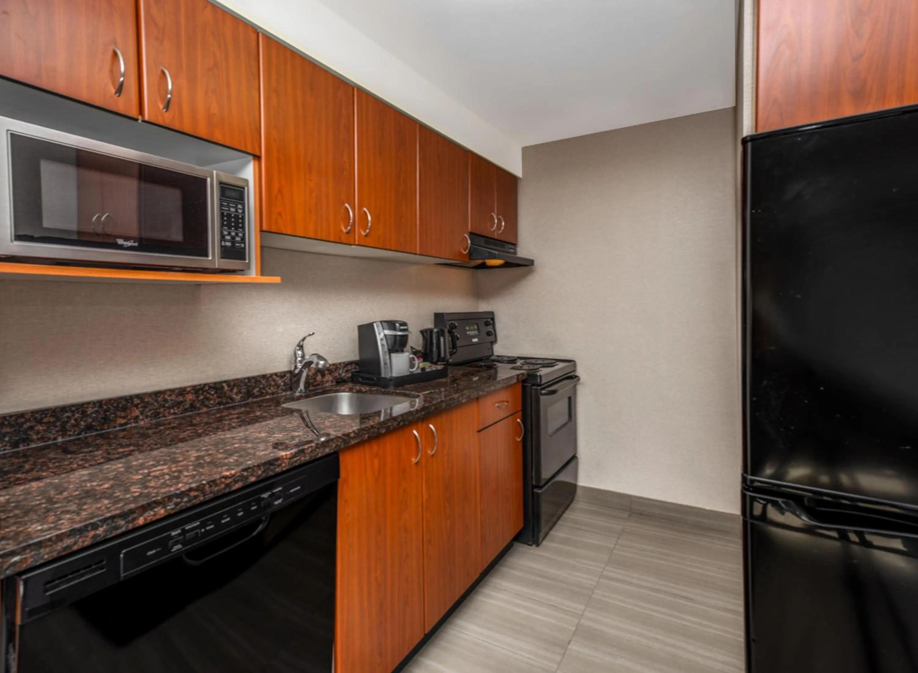 Bedroom in Coast Calgary Downtown Hotel & Suites by APA