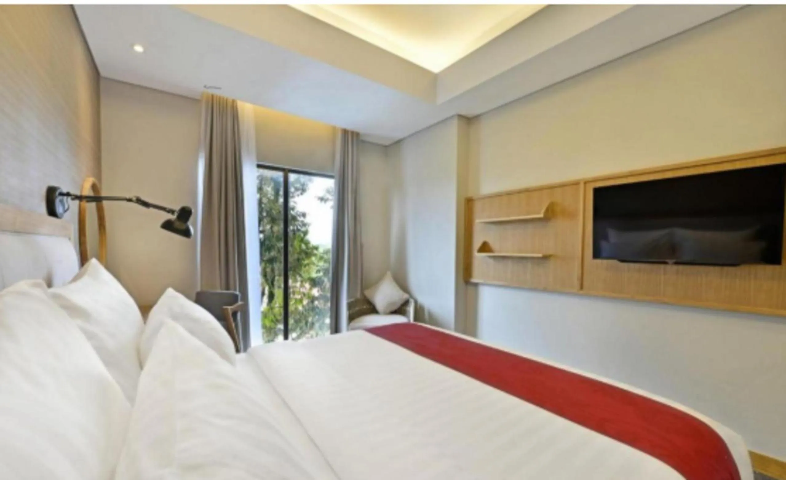 Bed in Famvida Hotel Lubuklinggau