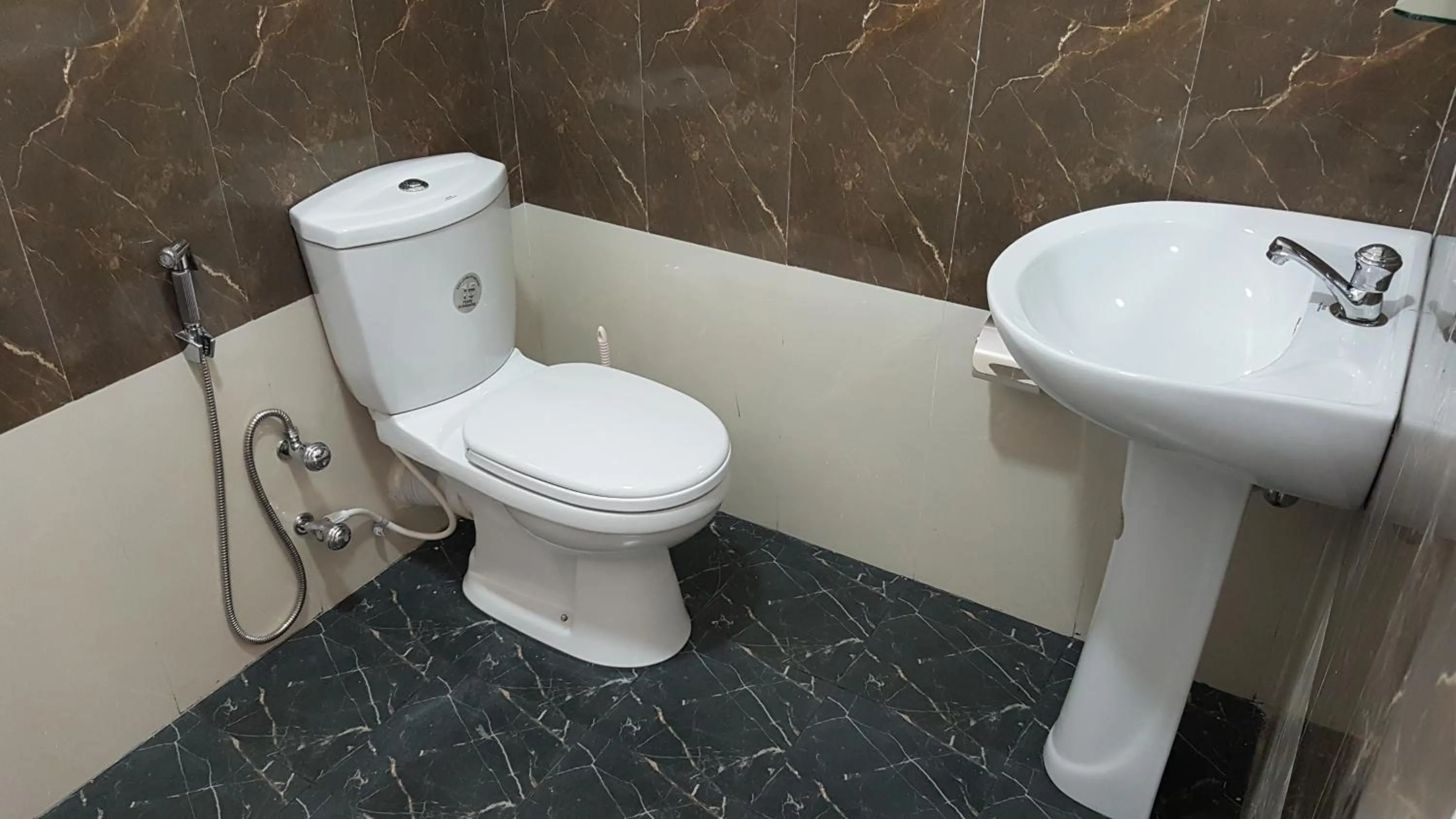 Toilet in Luna Beach Hotel