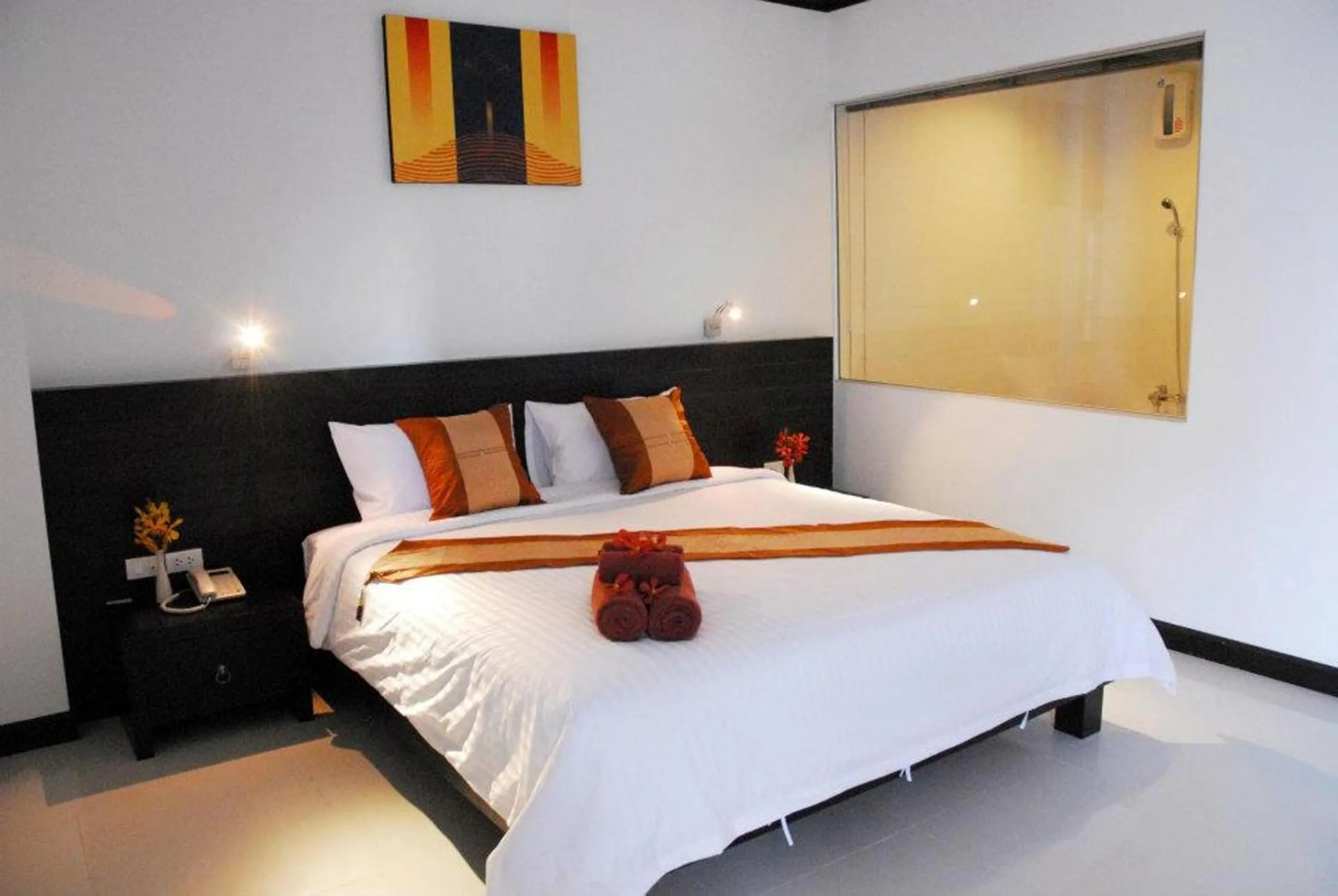 Bed in Tanawit Hotel & Spa