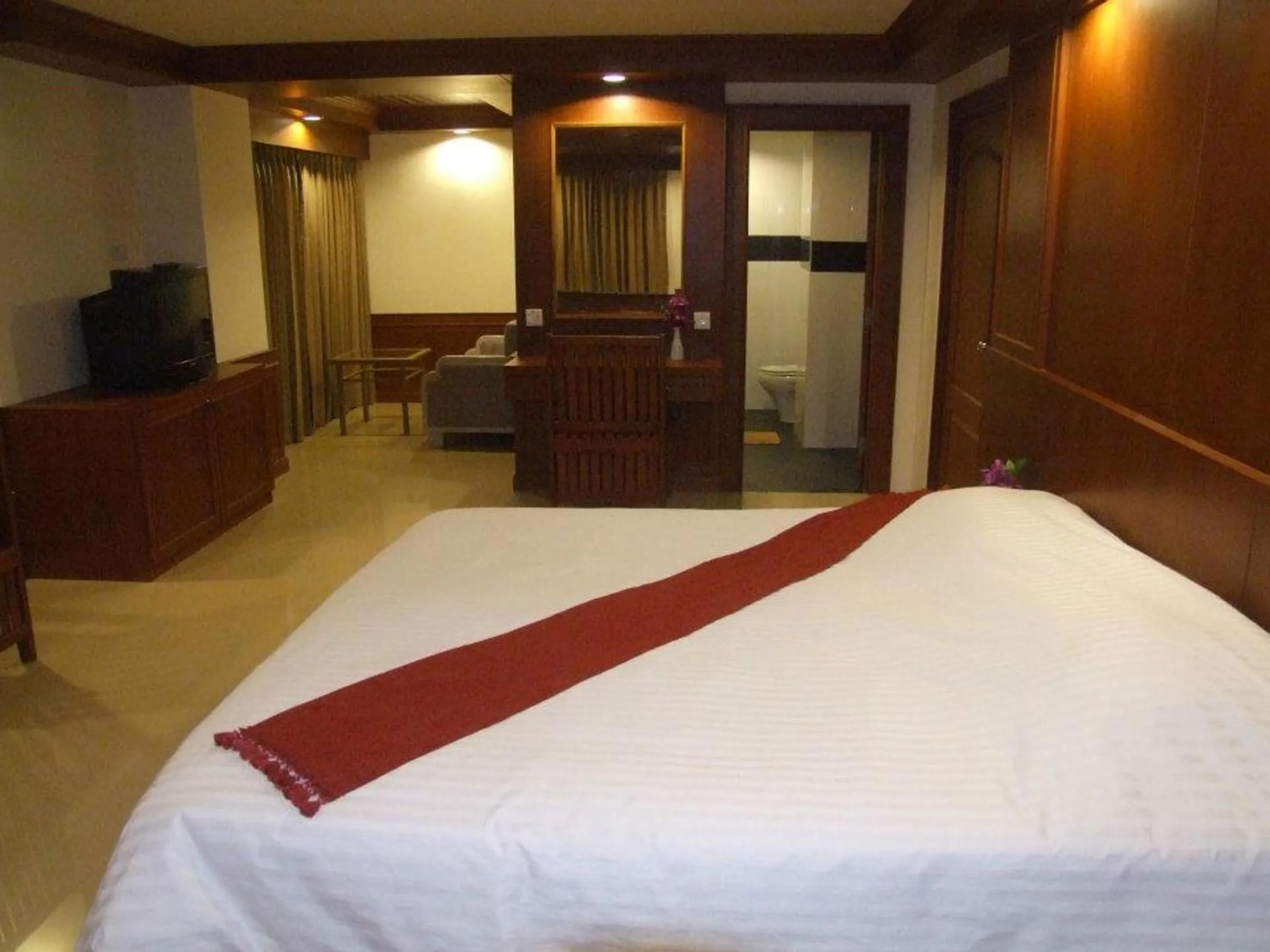 Bed in Tanawit Hotel & Spa