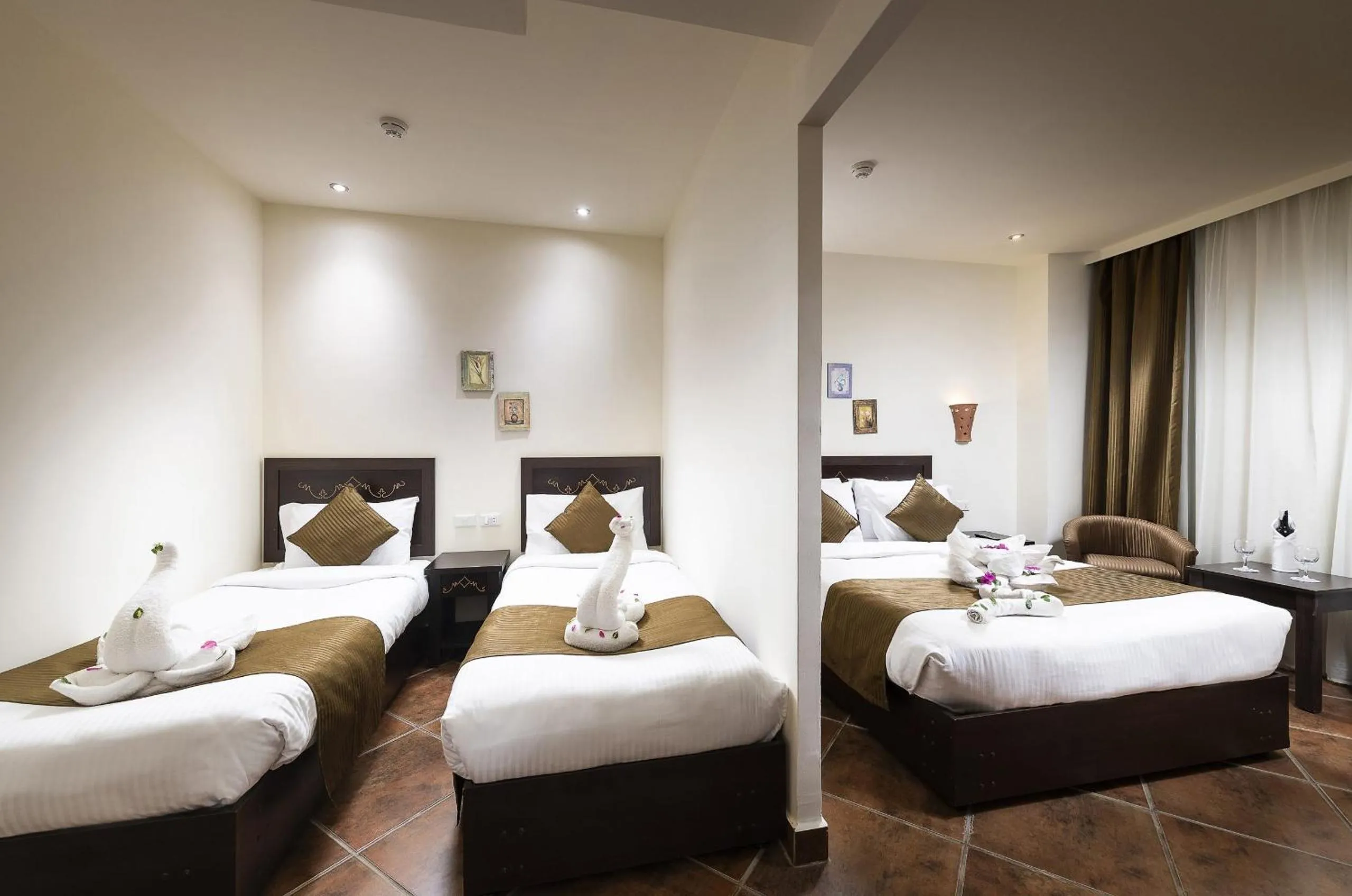 Photo of the whole room, Bed in Three Corners Sea Beach Resort