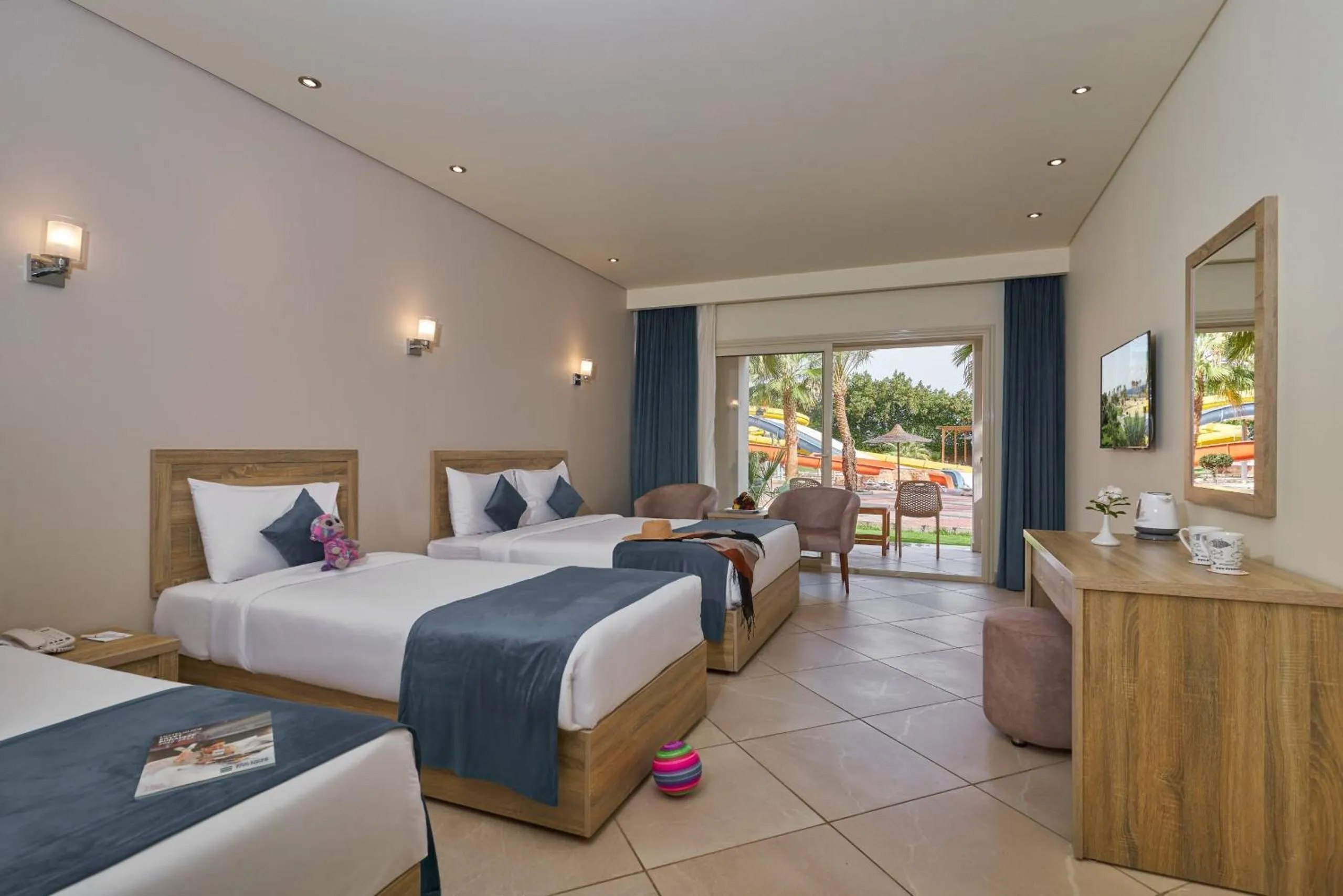 Photo of the whole room, Bed in Three Corners Sea Beach Resort