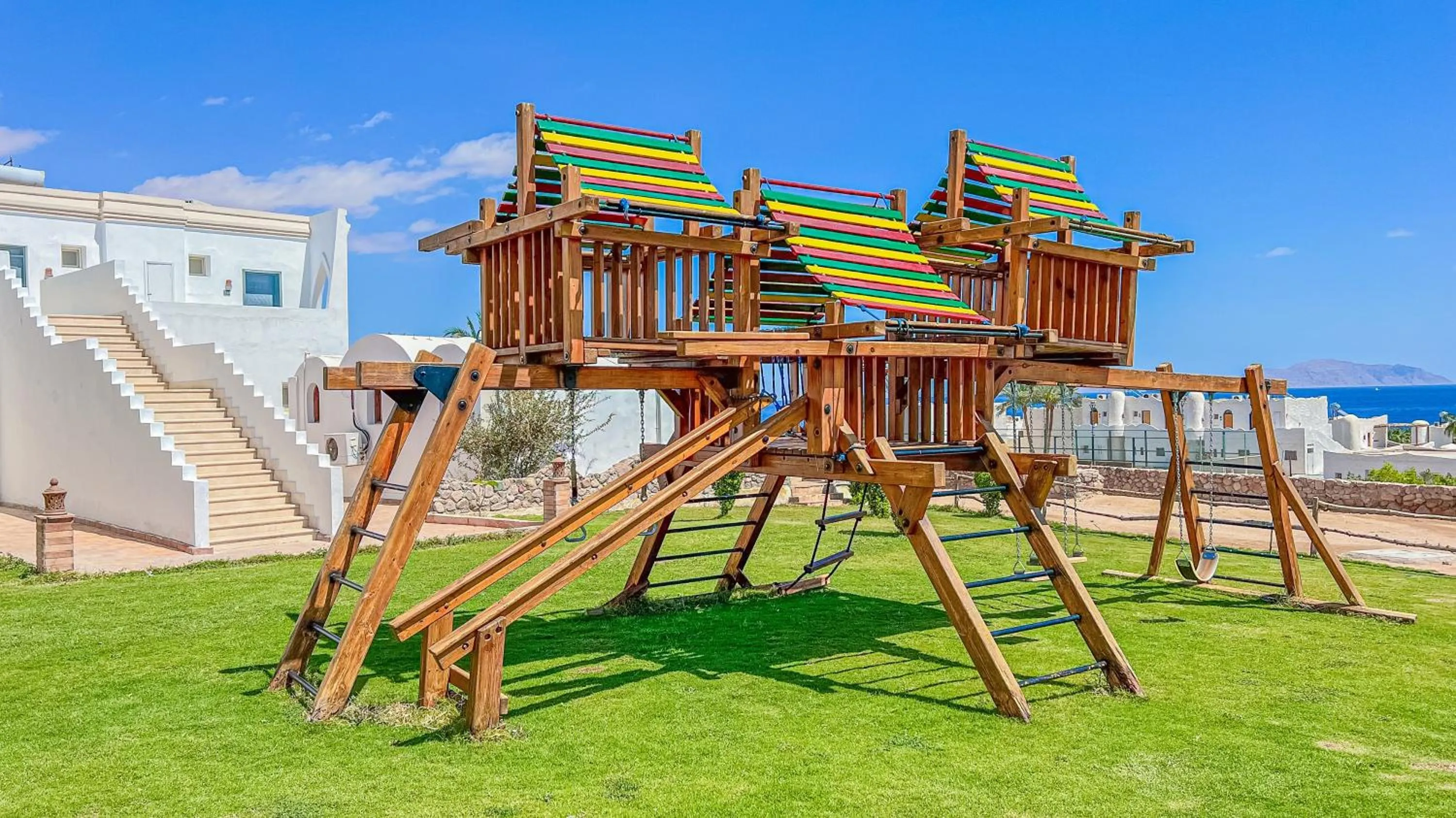 Children play ground in Club Reef Resort & Spa