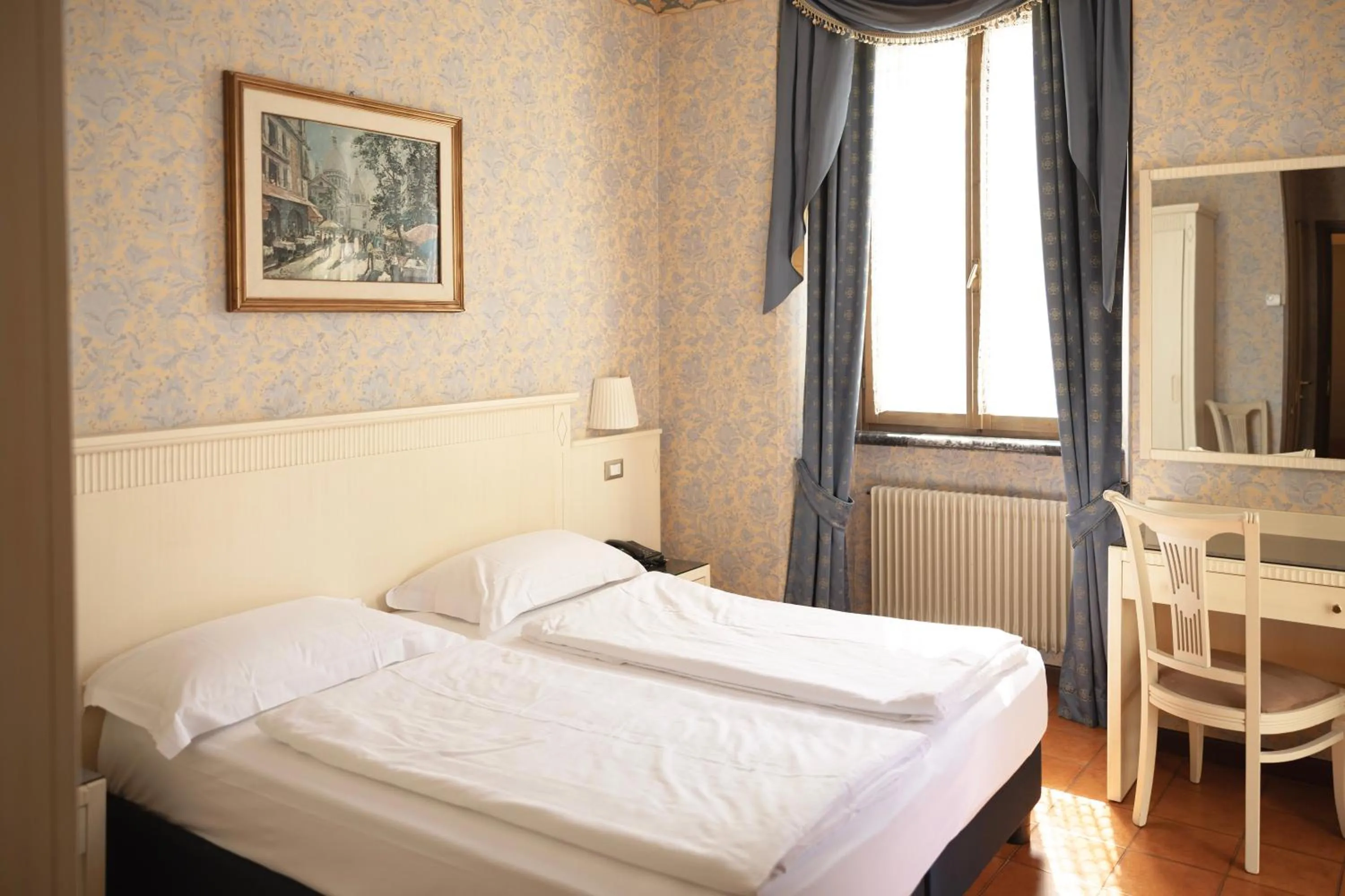 Bed in Hotel Le Palme