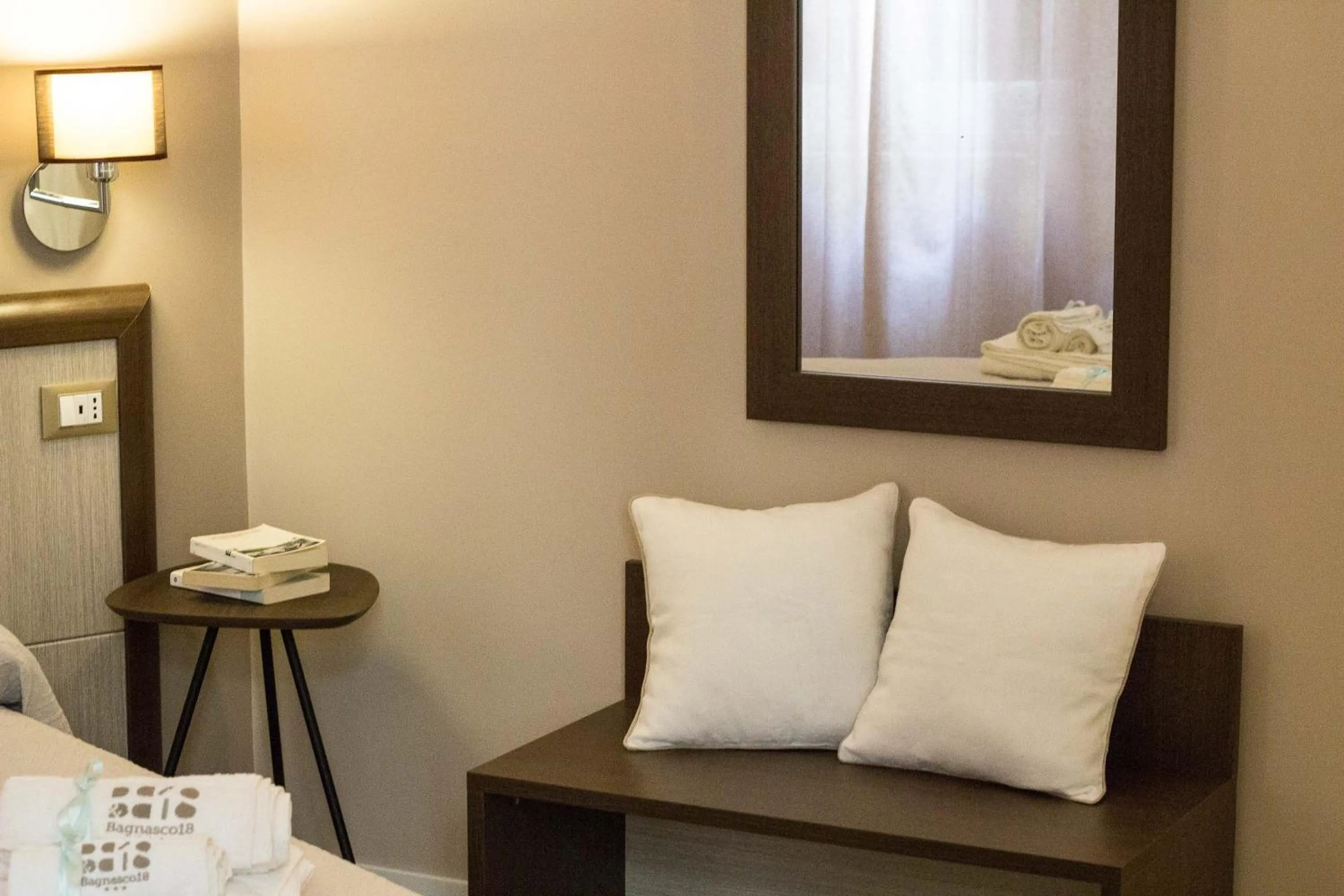 Decorative detail, Bed in Bagnasco 18 suite&terrace