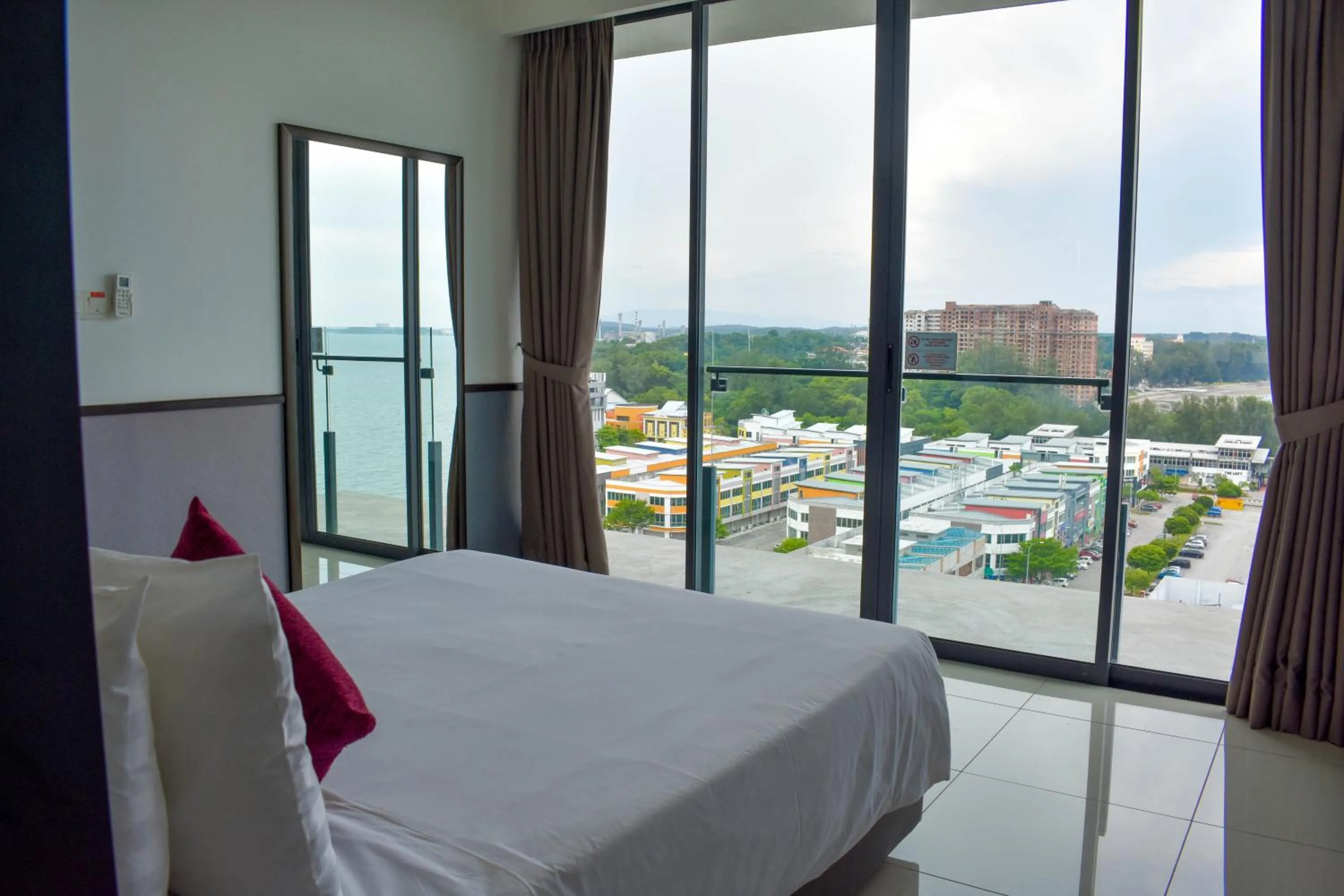 Bed in D'Wharf Hotel & Serviced Residence