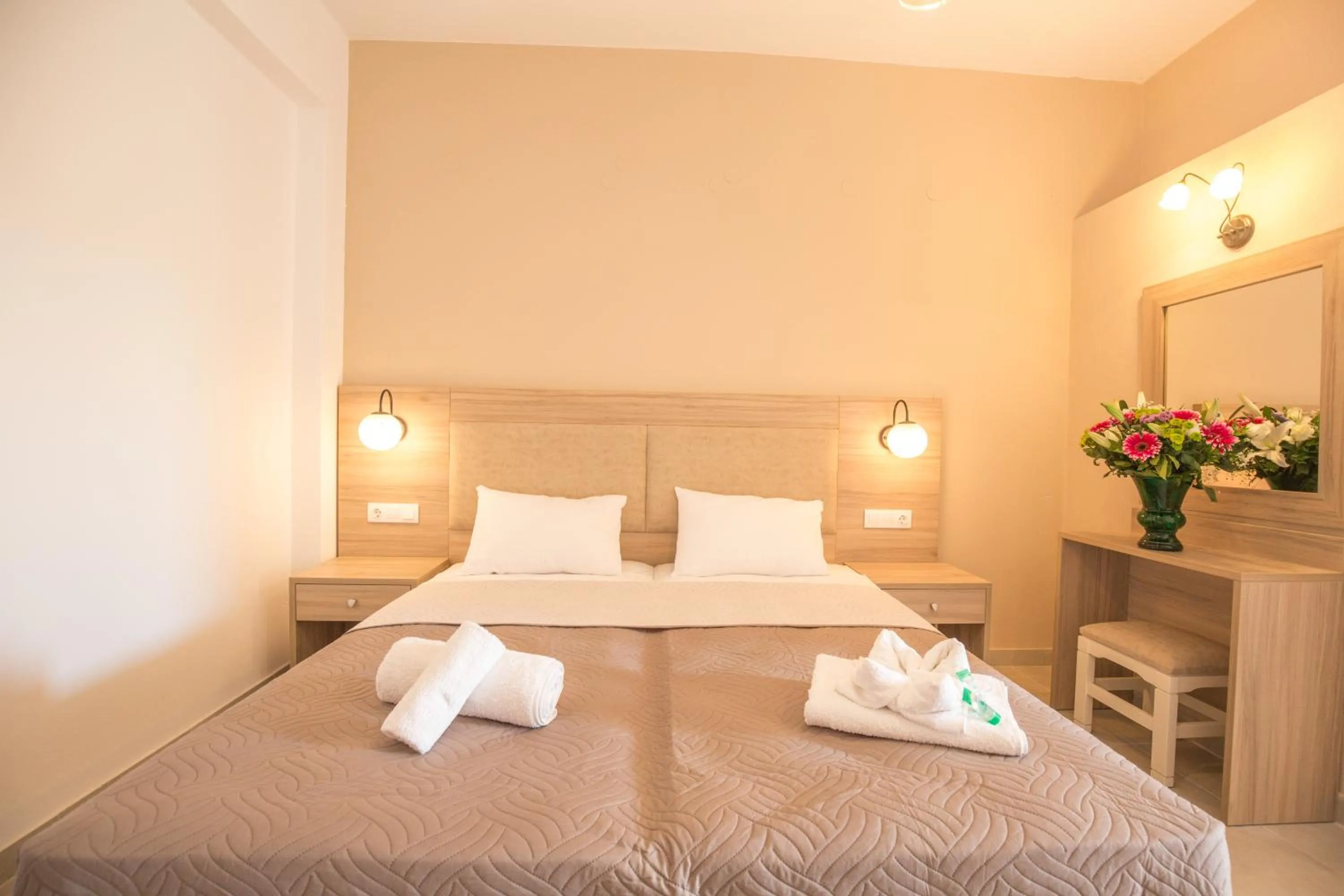 Bed in Mastorakis Hotel and Studios