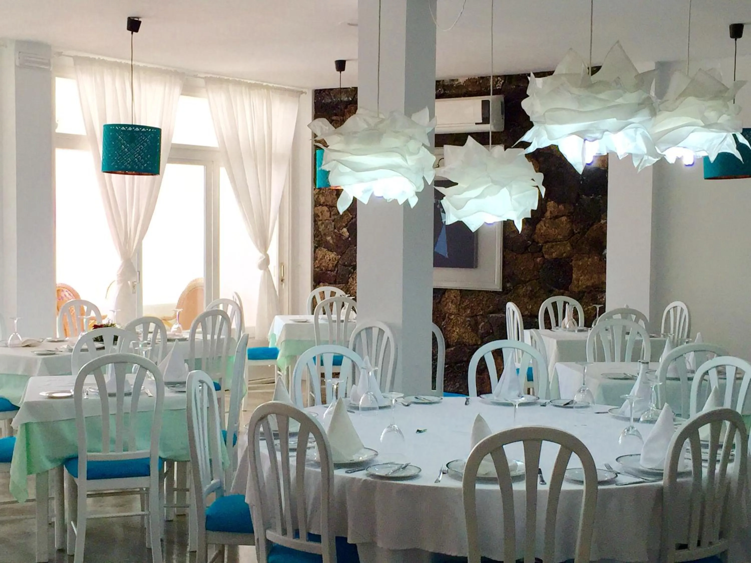 Dining area in Neptuno Suites - Adults Only