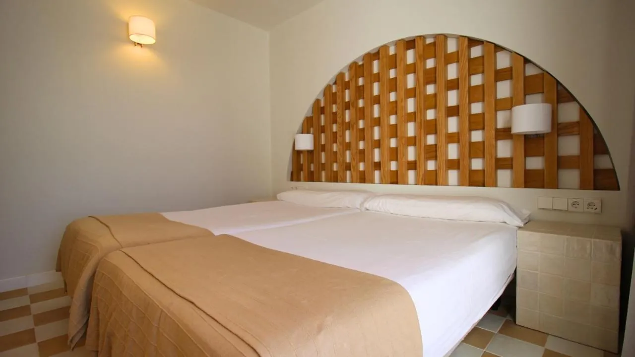 Bed in Neptuno Suites - Adults Only
