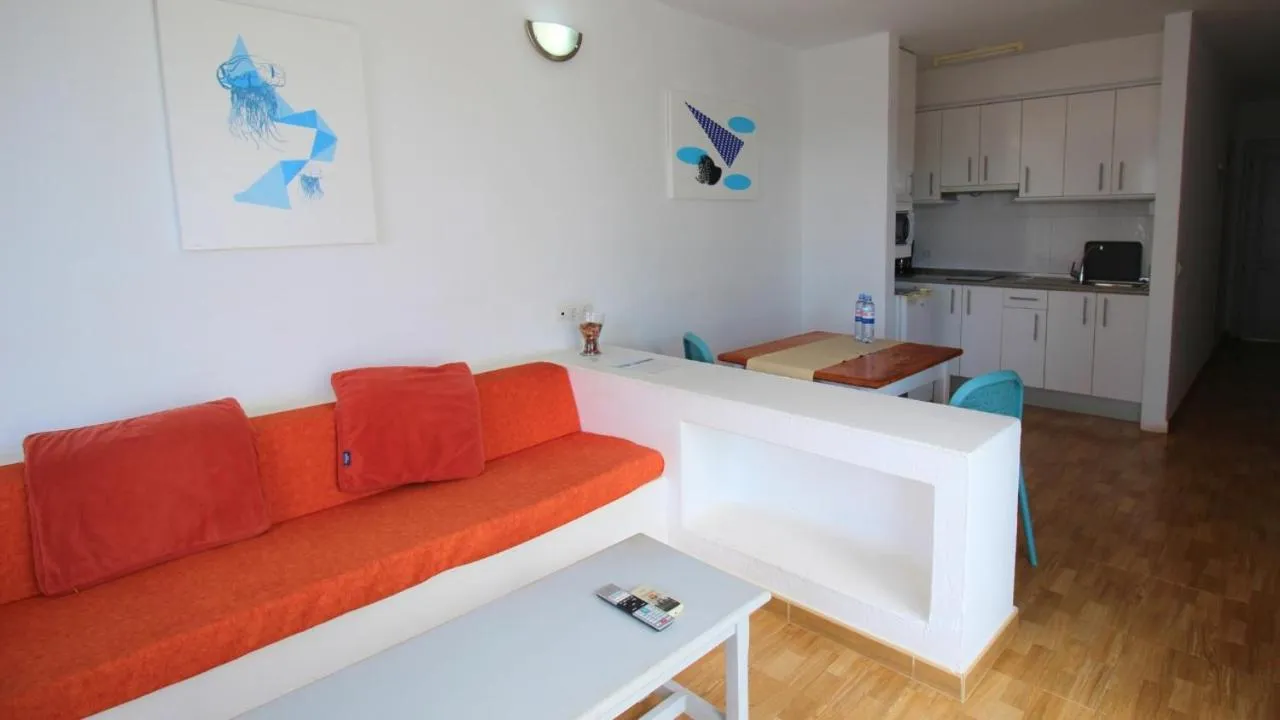 Living room, Bed in Neptuno Suites - Adults Only