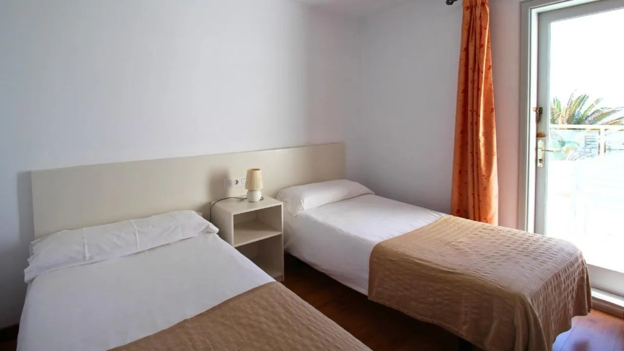 Bed in Neptuno Suites - Adults Only