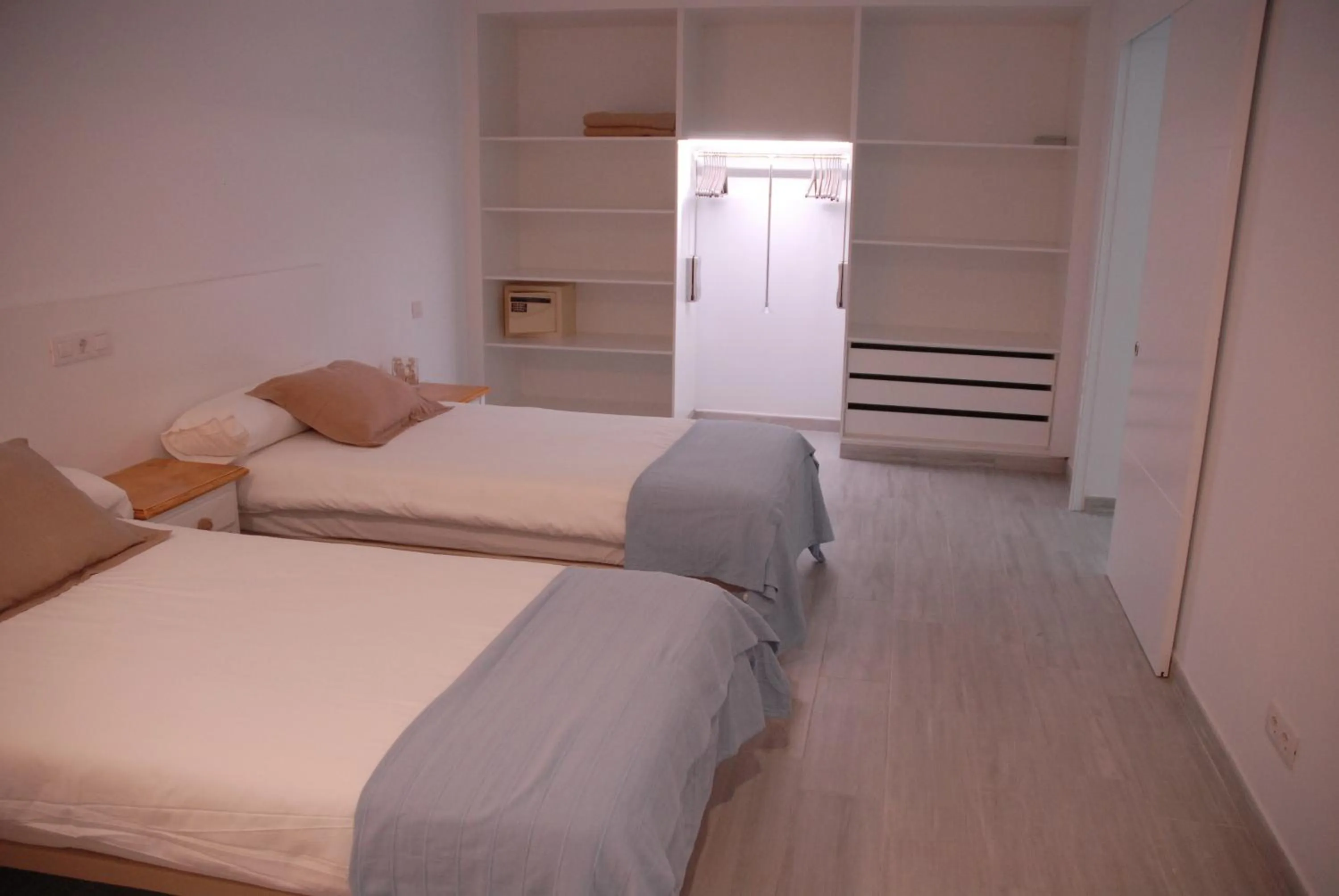 Bed in Neptuno Suites - Adults Only