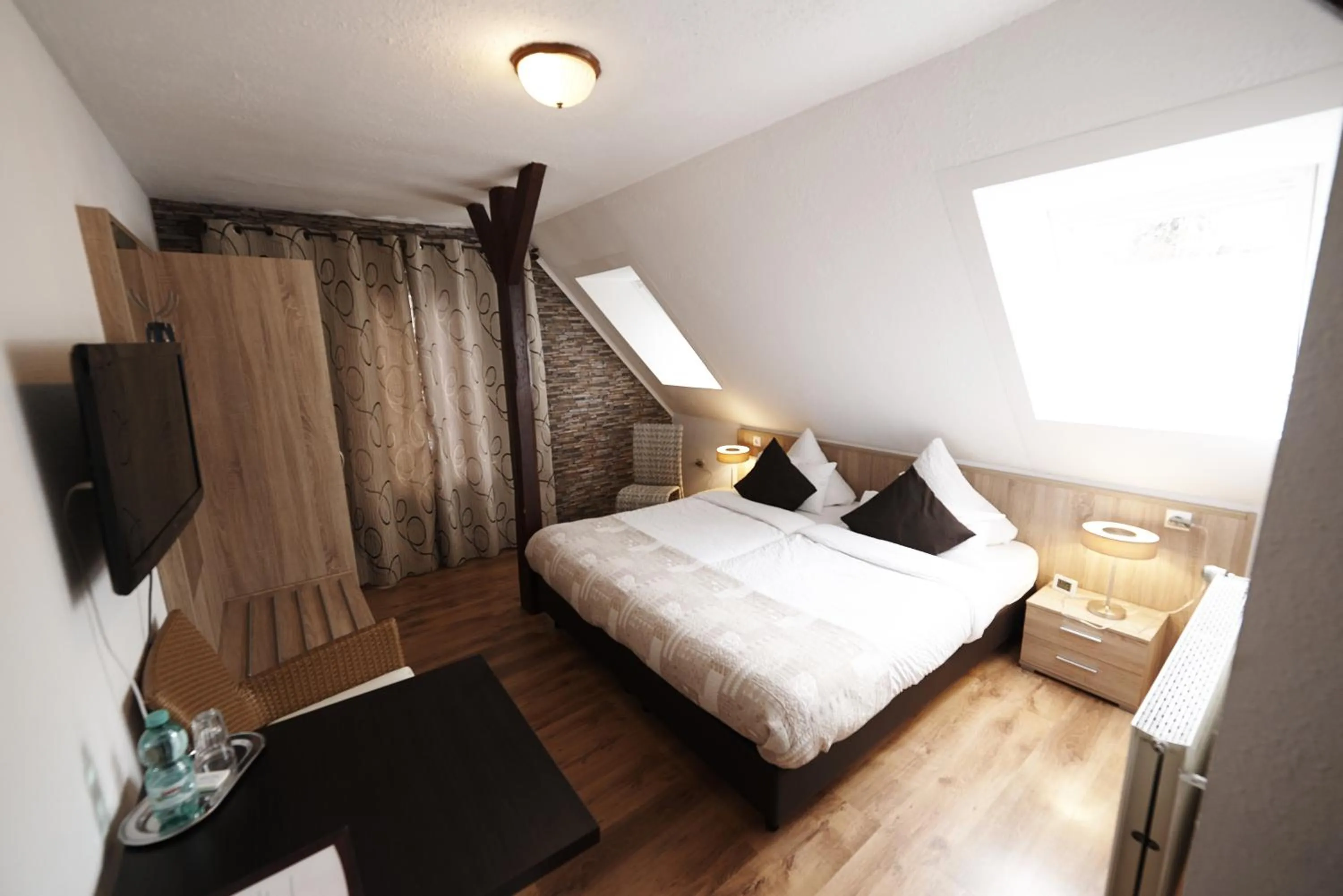 Bed in Hotel Wurster Kroog