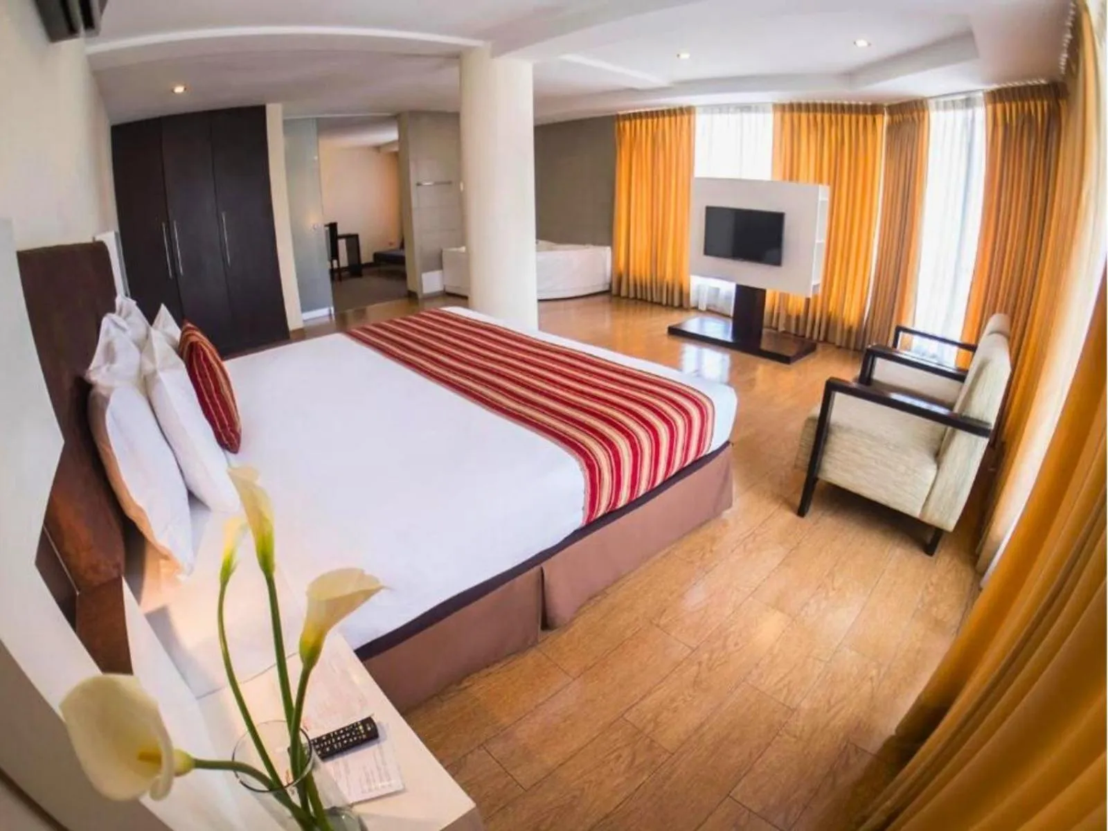 Bed in Allpa Hotel & Suites