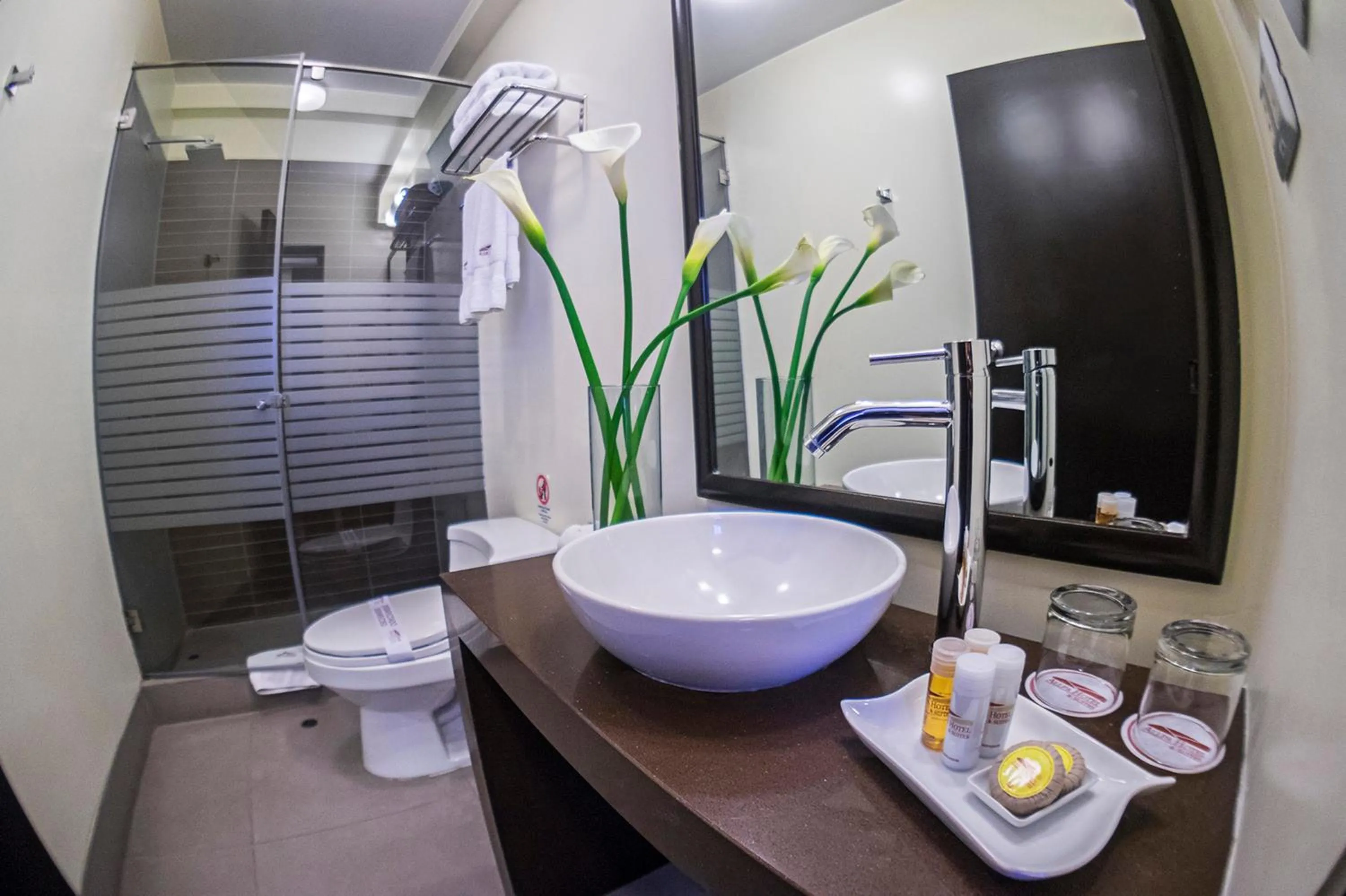 Bathroom in Allpa Hotel & Suites