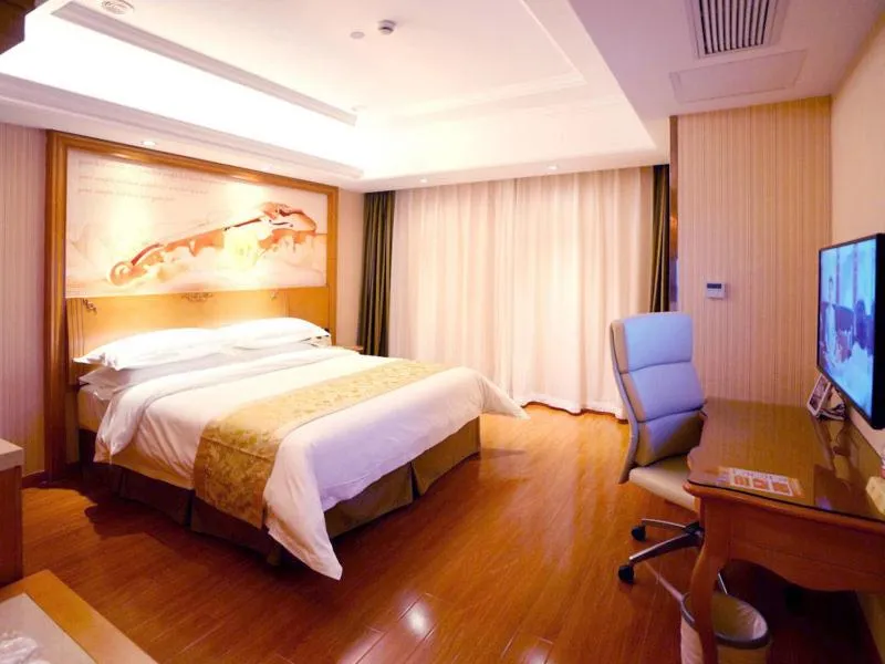 Bed in Vienna Hotel Shanghai Meilan Lake Metro Station