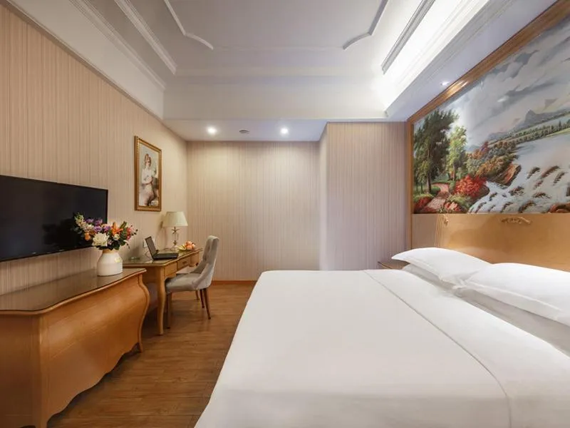 Bed in Vienna International Hotel Fuzhou Cangshan Wanda