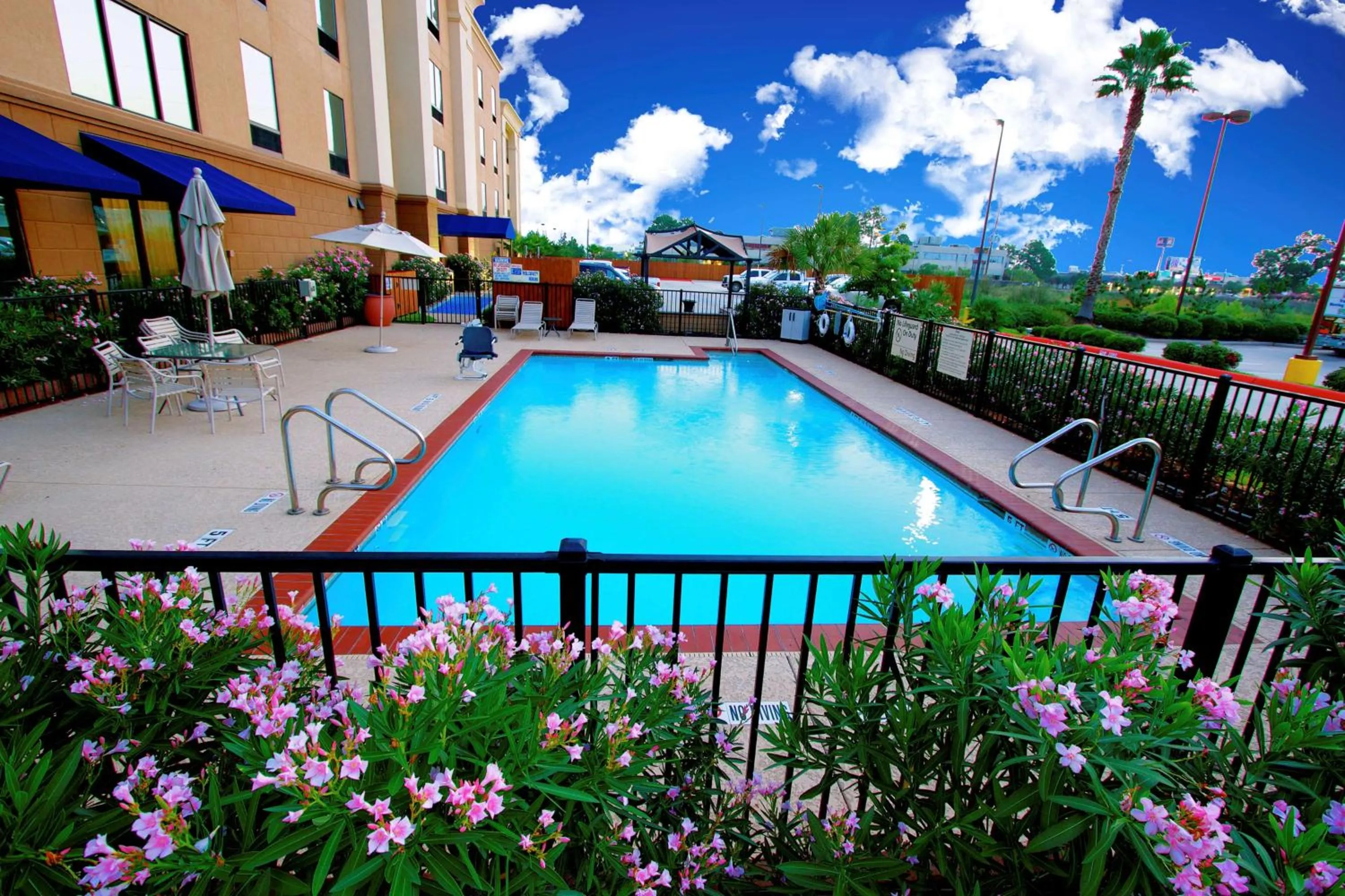 Pool view in Hampton Inn & Suites by Hilton Tomball Houston NW
