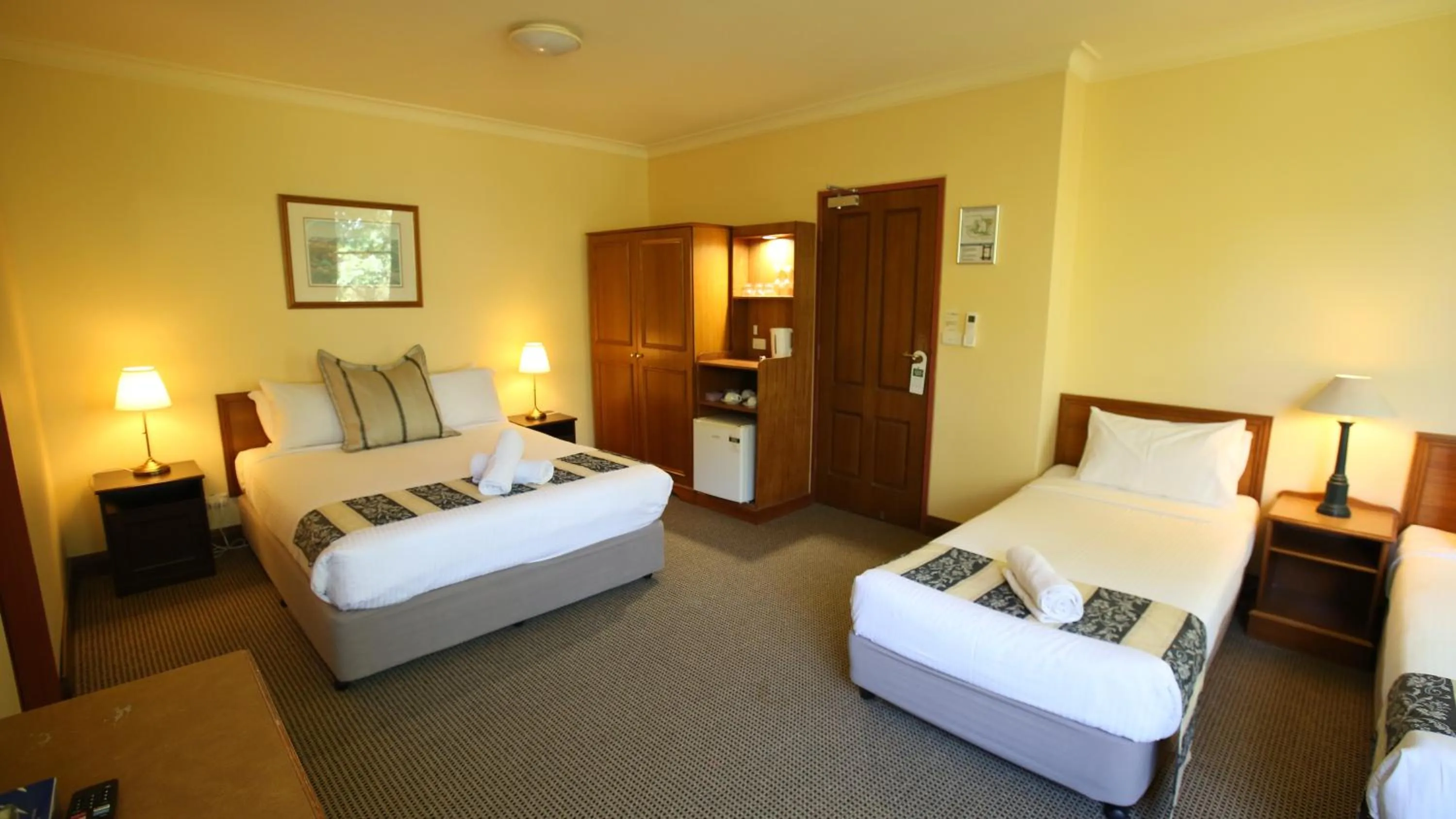 Bed in La Maison Boutique Hotel