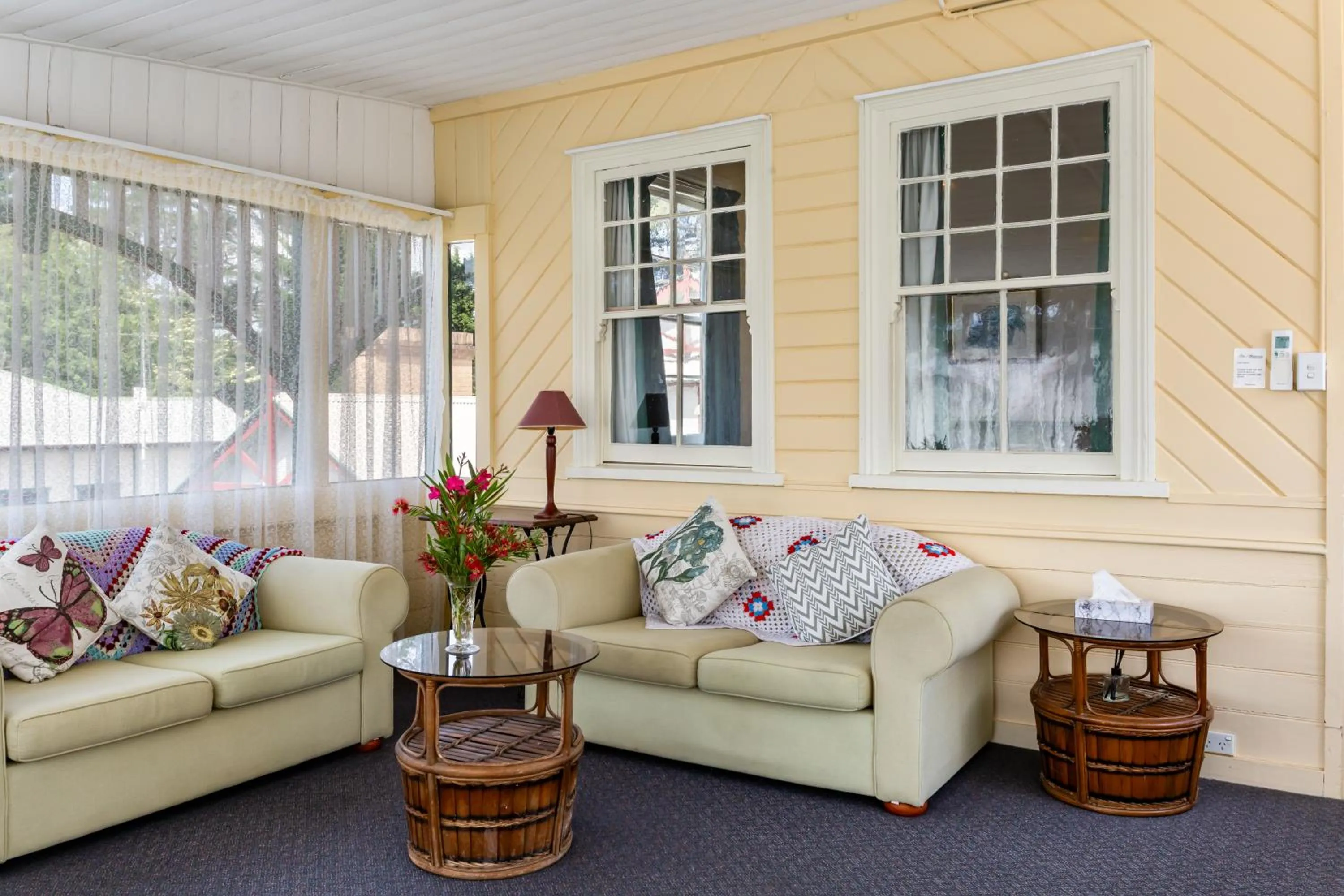 Communal lounge/ TV room in La Maison Boutique Hotel