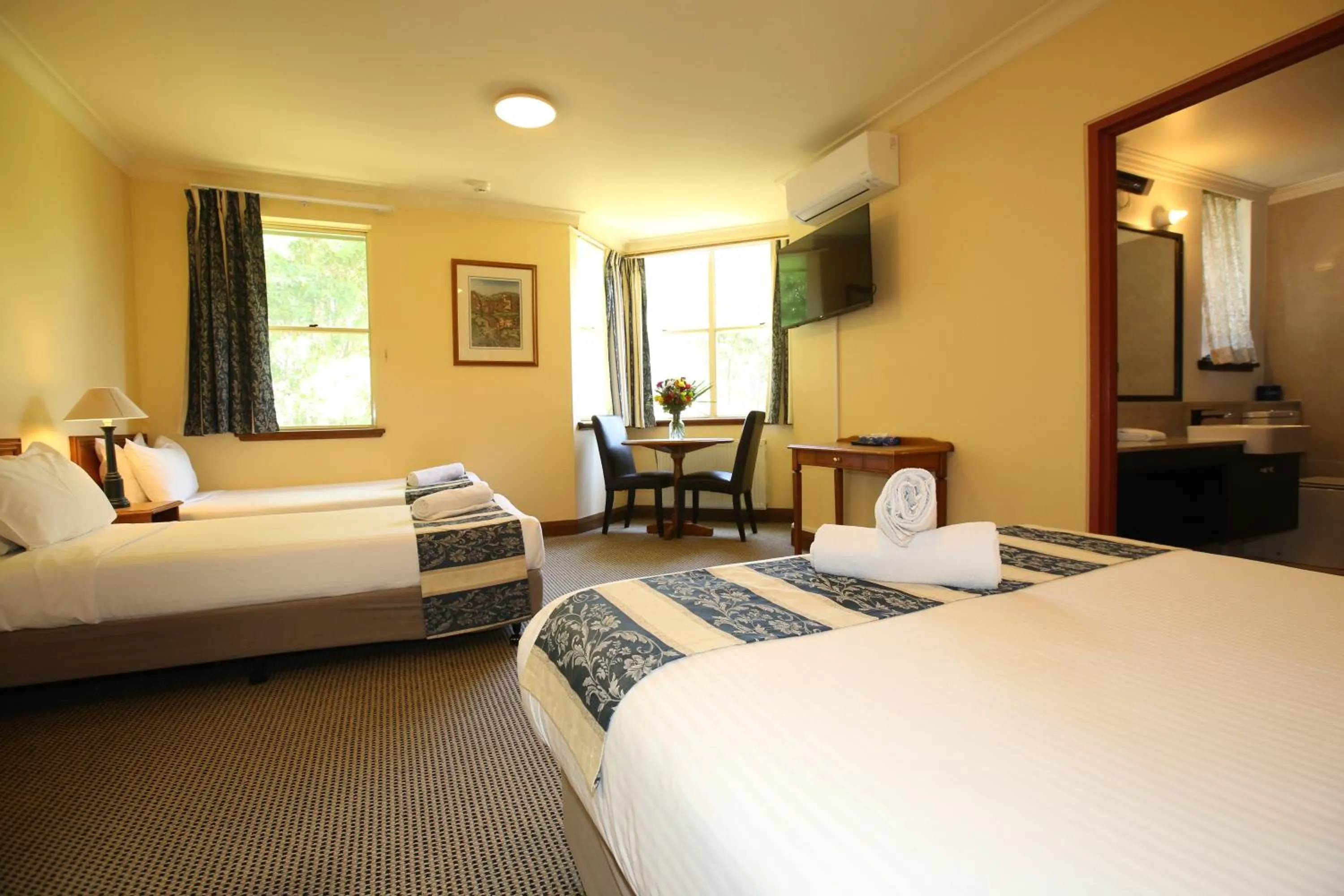 Bed in La Maison Boutique Hotel