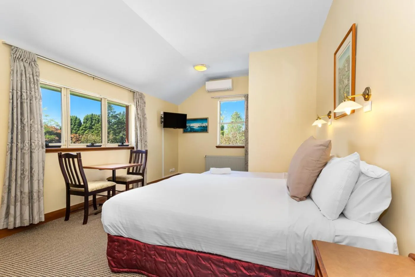 Bed in La Maison Boutique Hotel