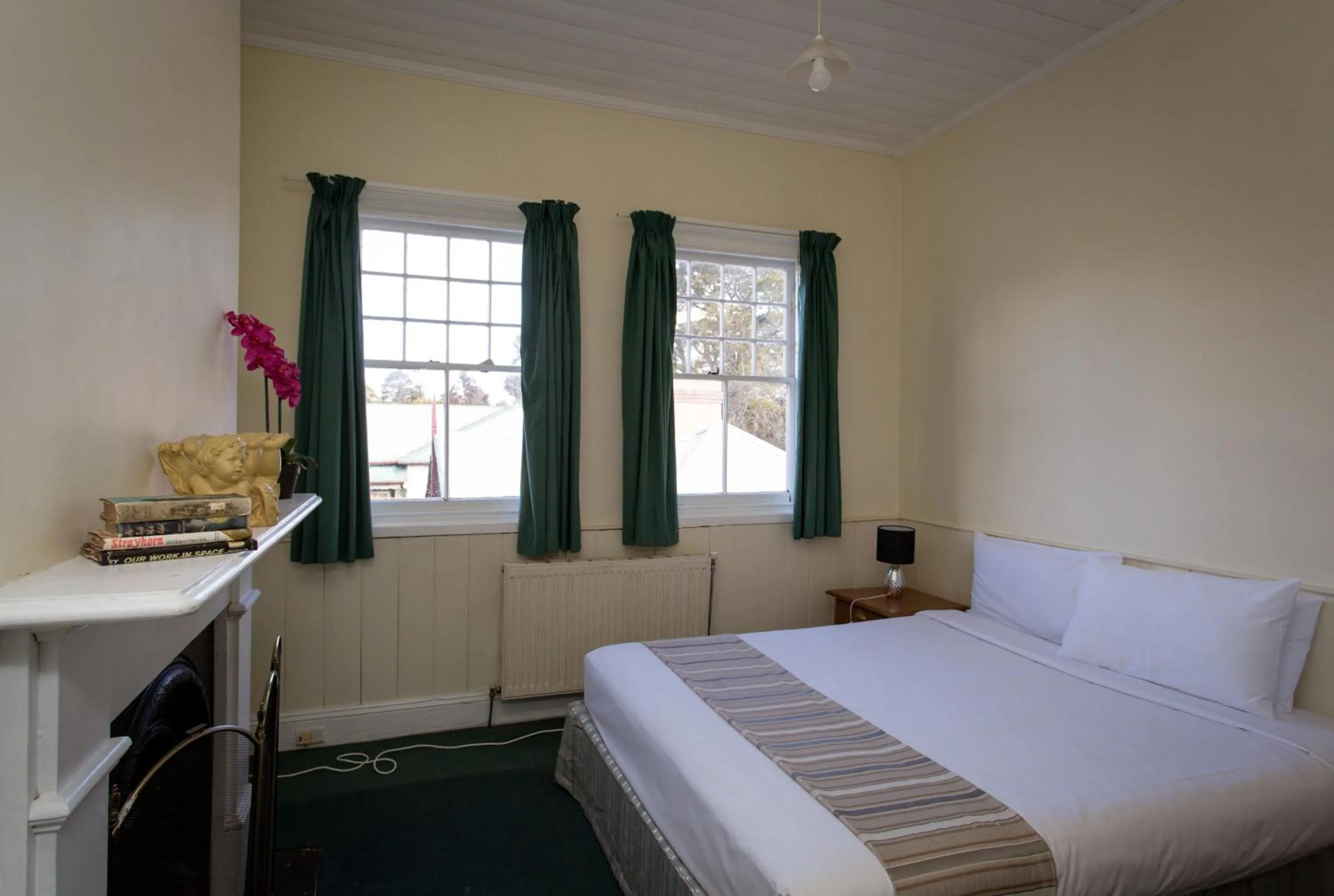 Bed in La Maison Boutique Hotel