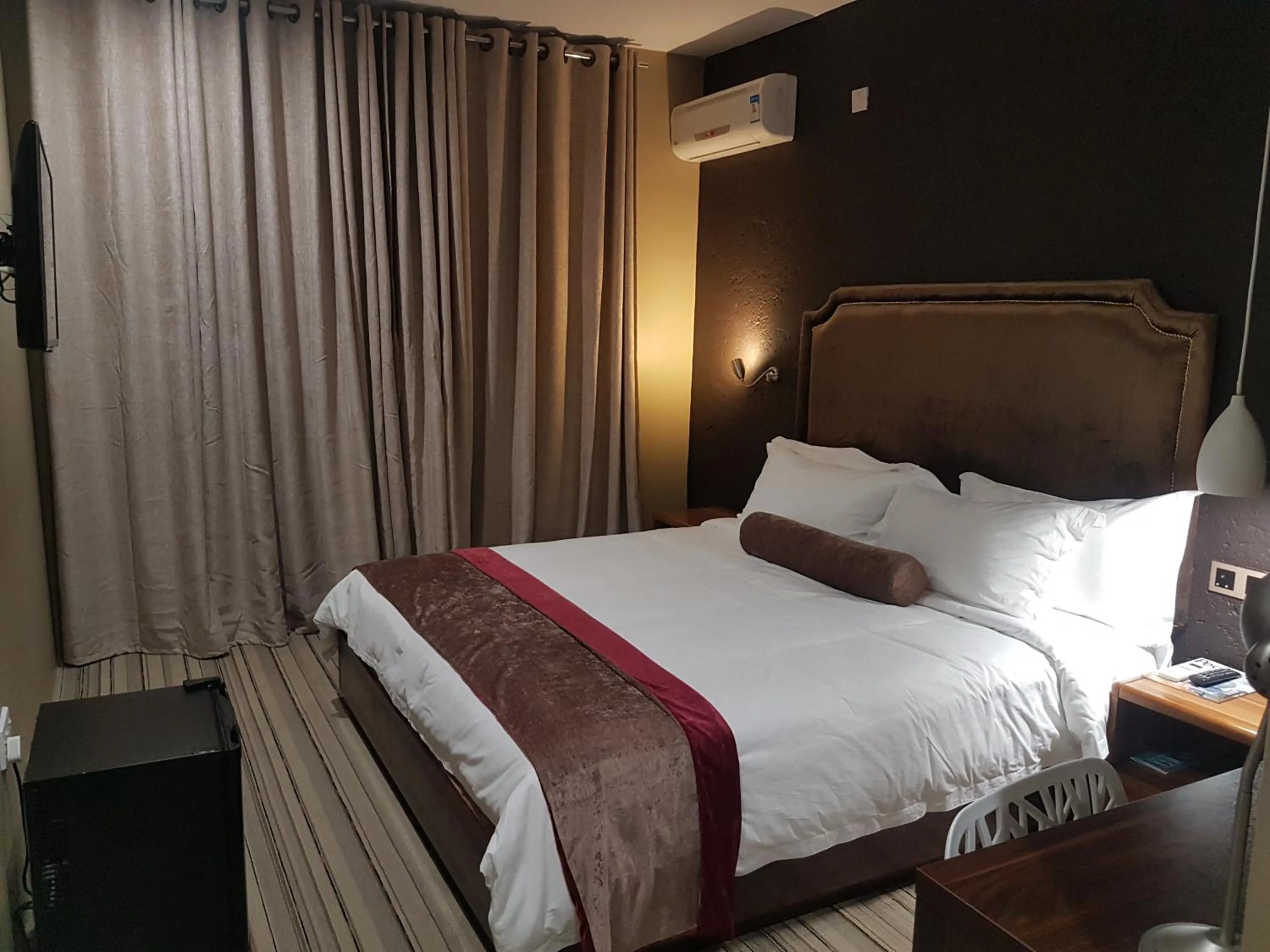 Bed in La Signature Guest house