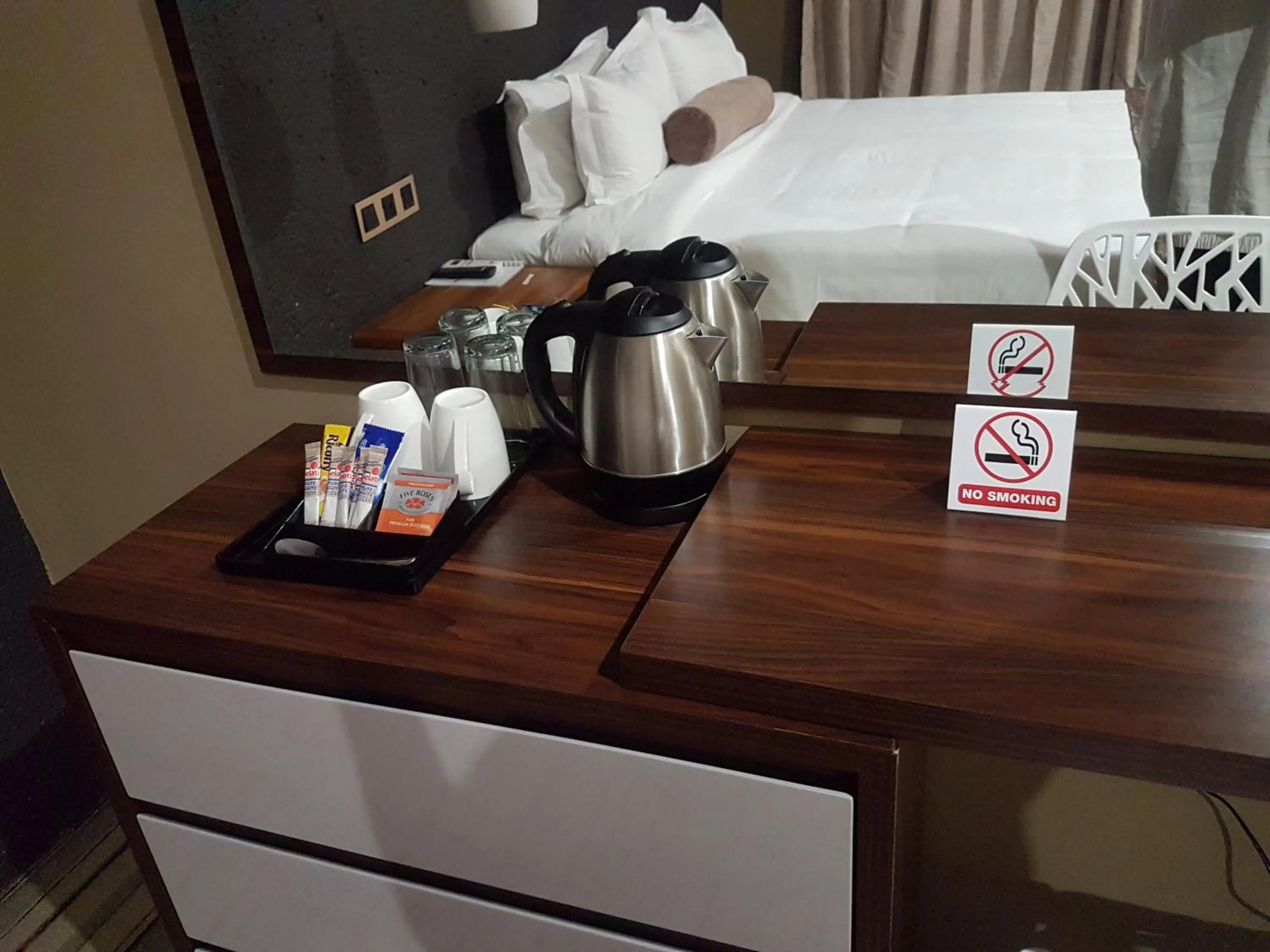 Bed in La Signature Guest house