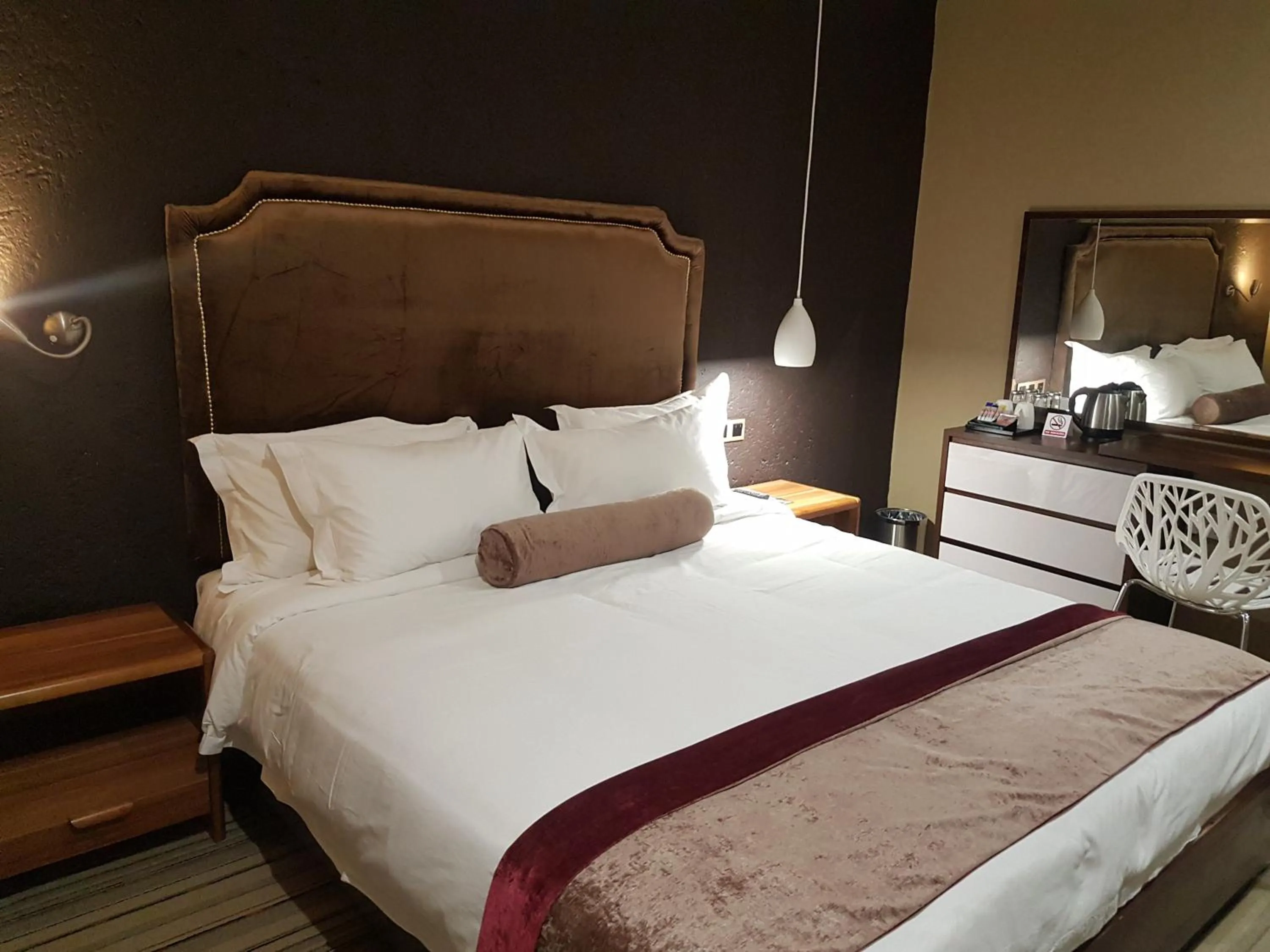 Bed in La Signature Guest house