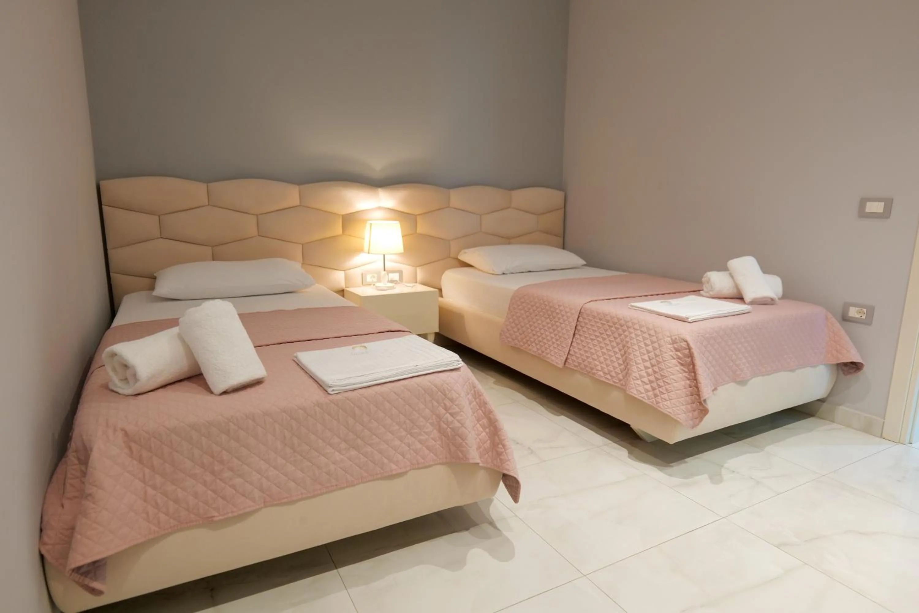 Bed in Oceanic Overview Suites