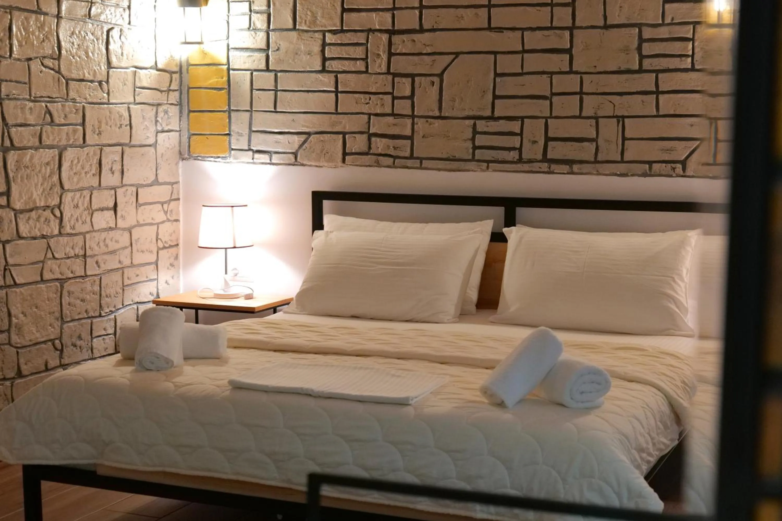 Bed in Oceanic Overview Suites