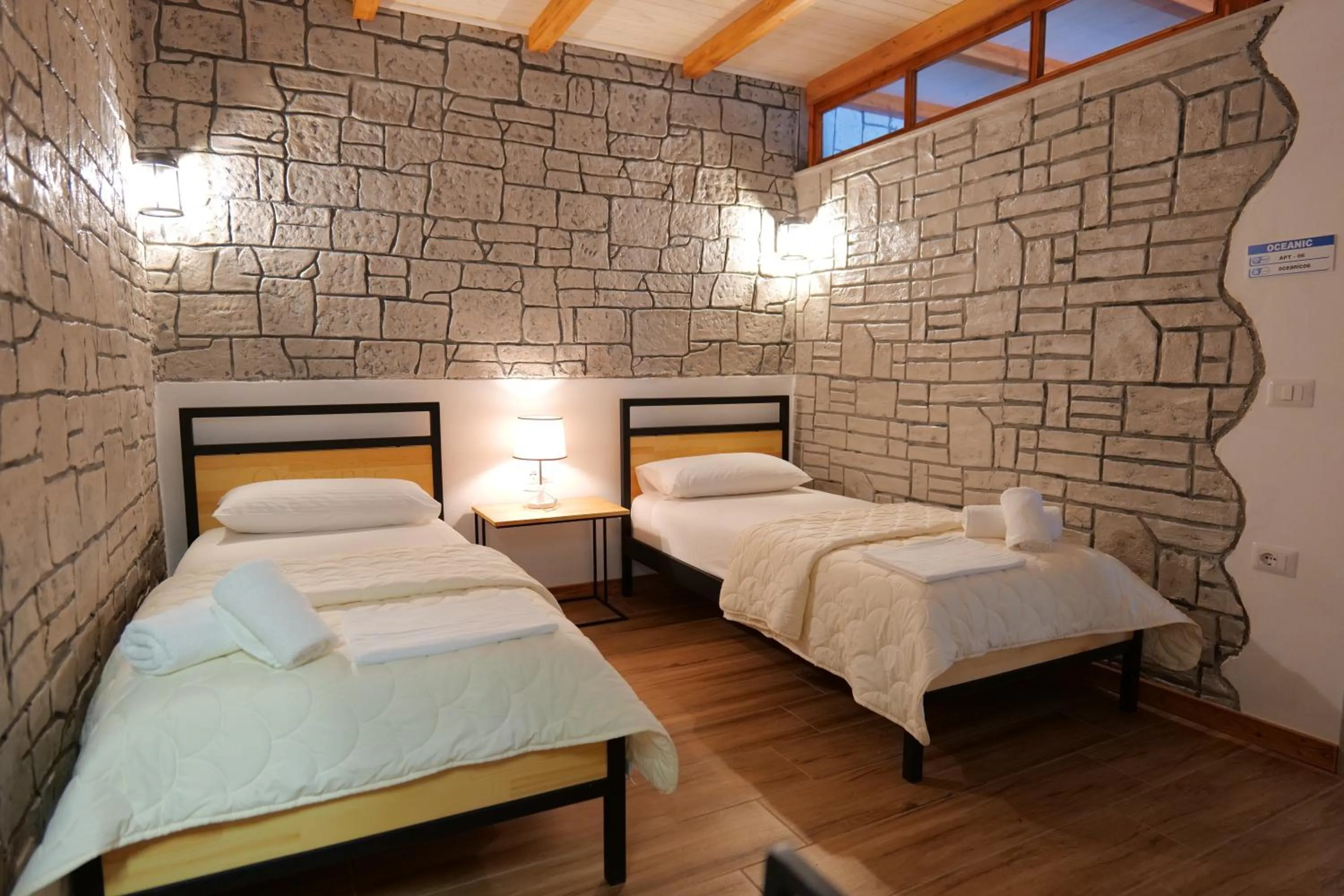 Bed in Oceanic Overview Suites