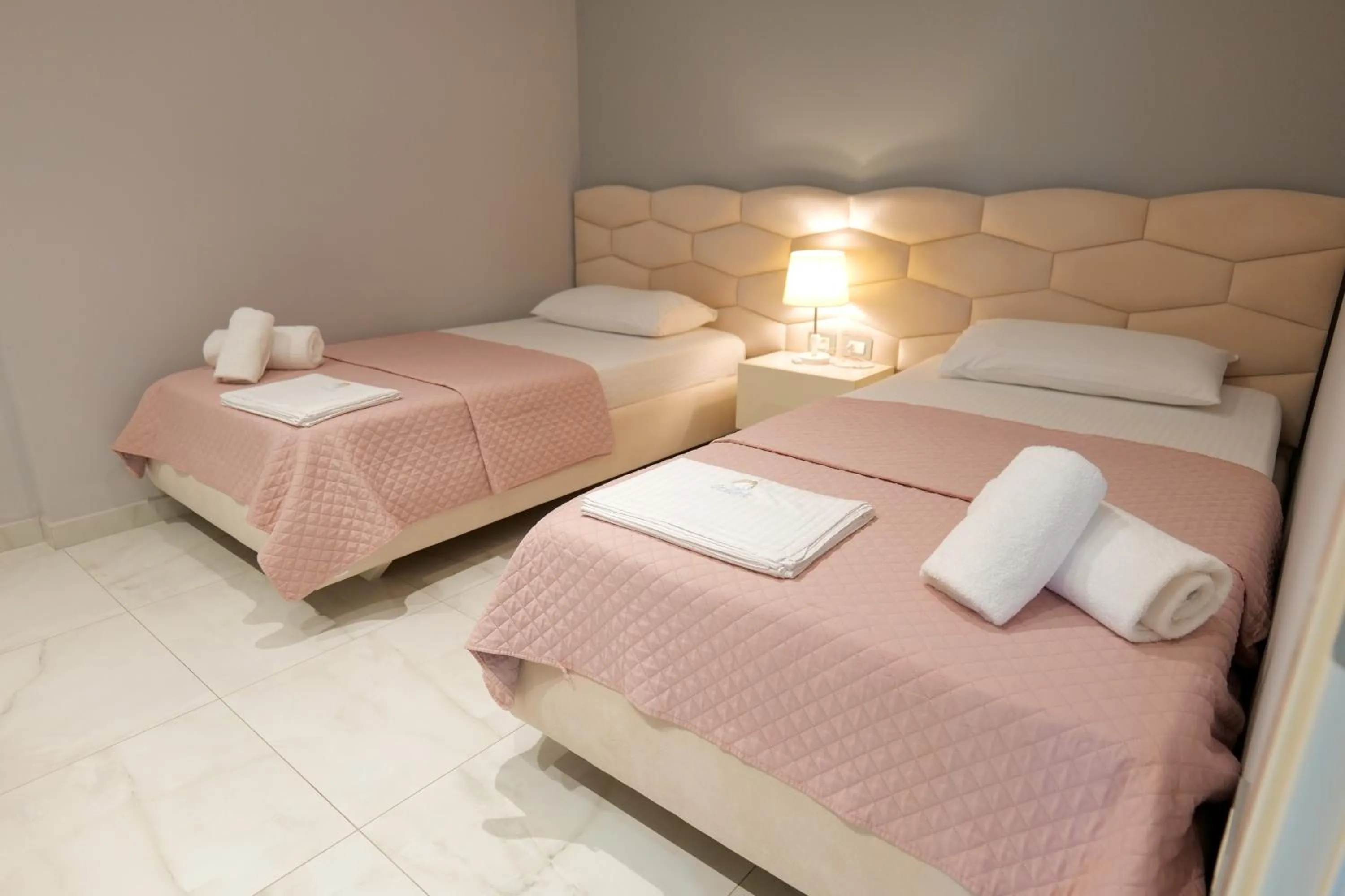 Bed in Oceanic Overview Suites