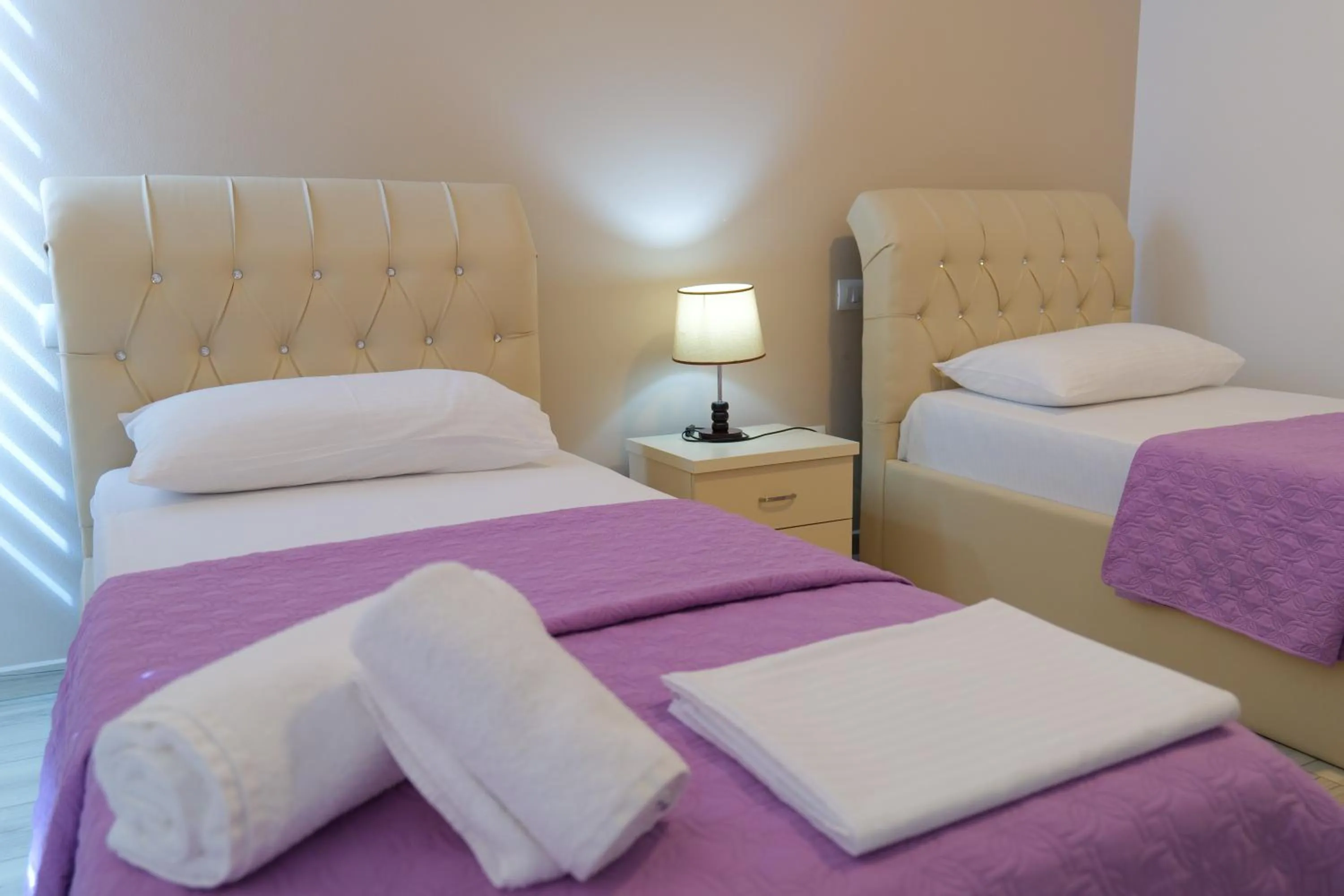 Bed in Oceanic Overview Suites