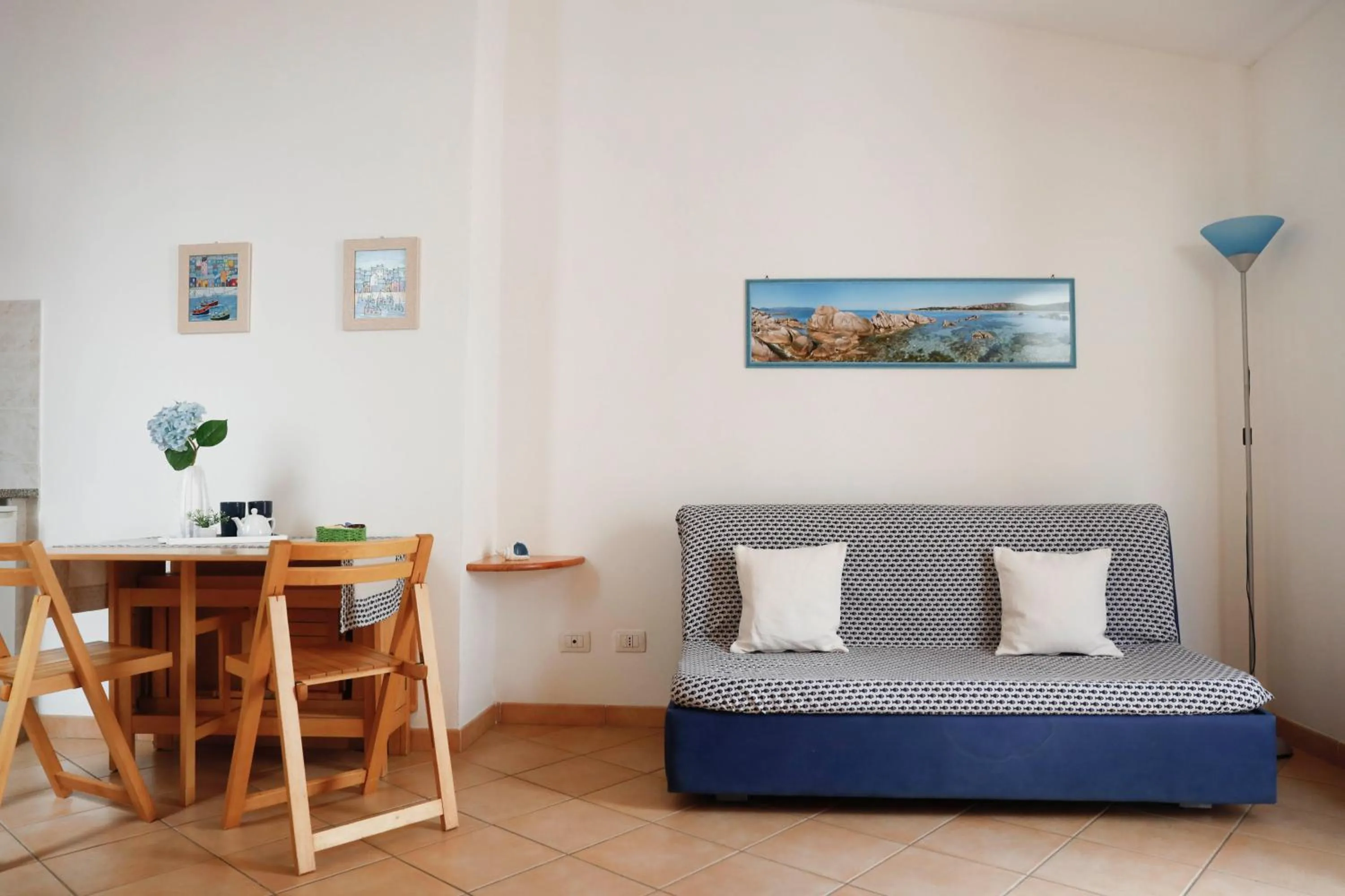 Living room, Bed in Il Melo Residence