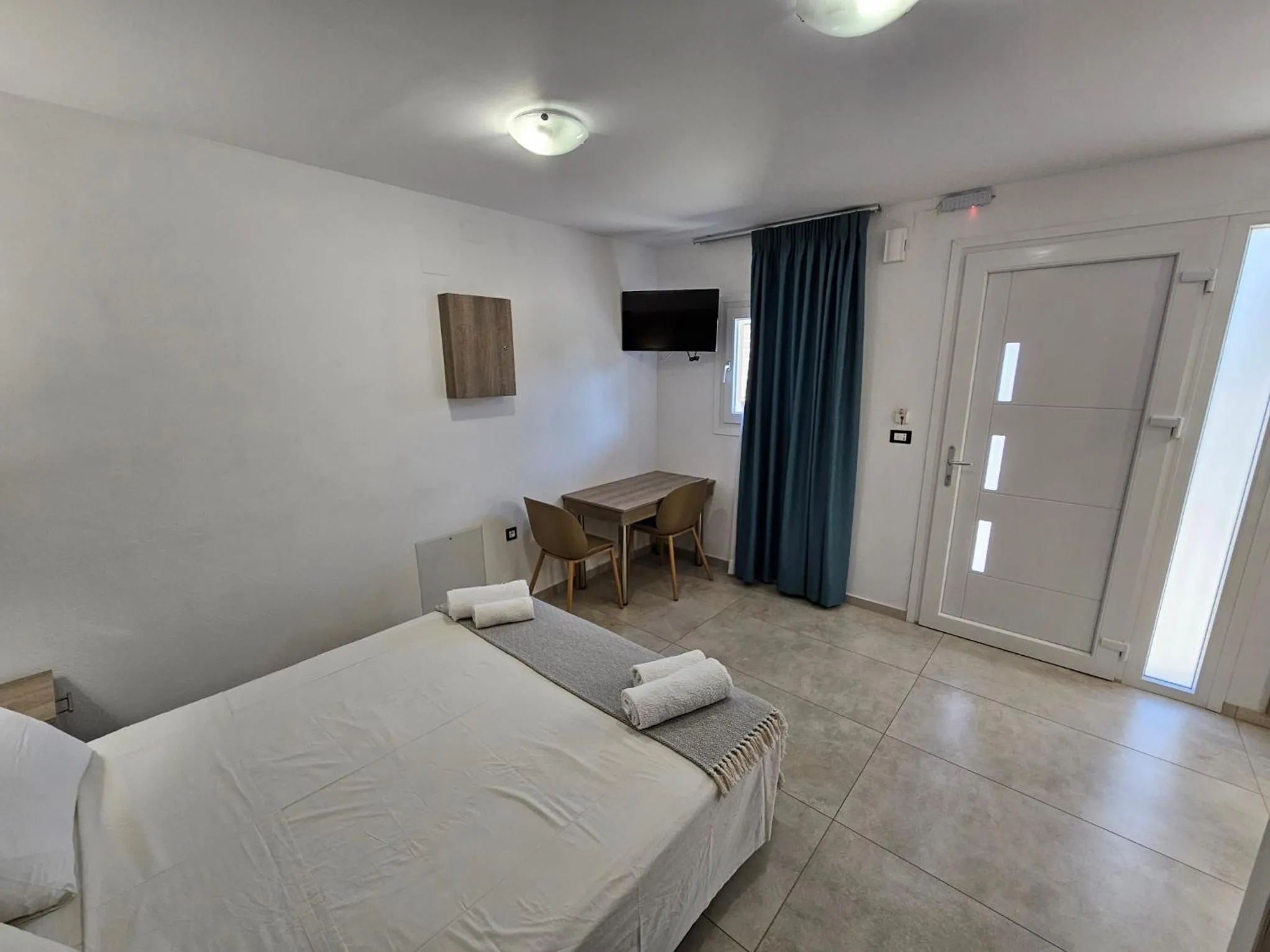 Bed in Elounda Sunrise Apartments