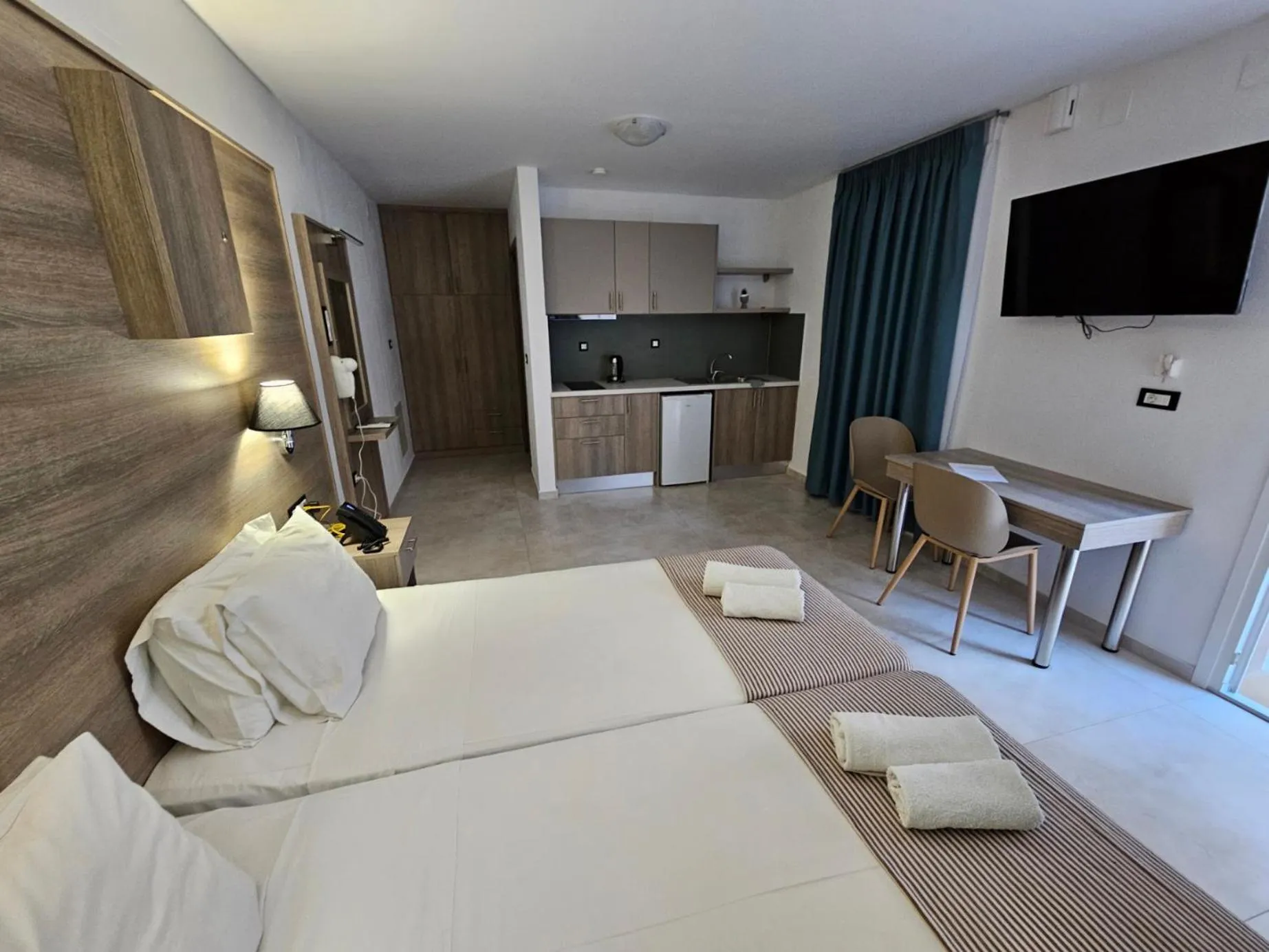 Bed in Elounda Sunrise Apartments