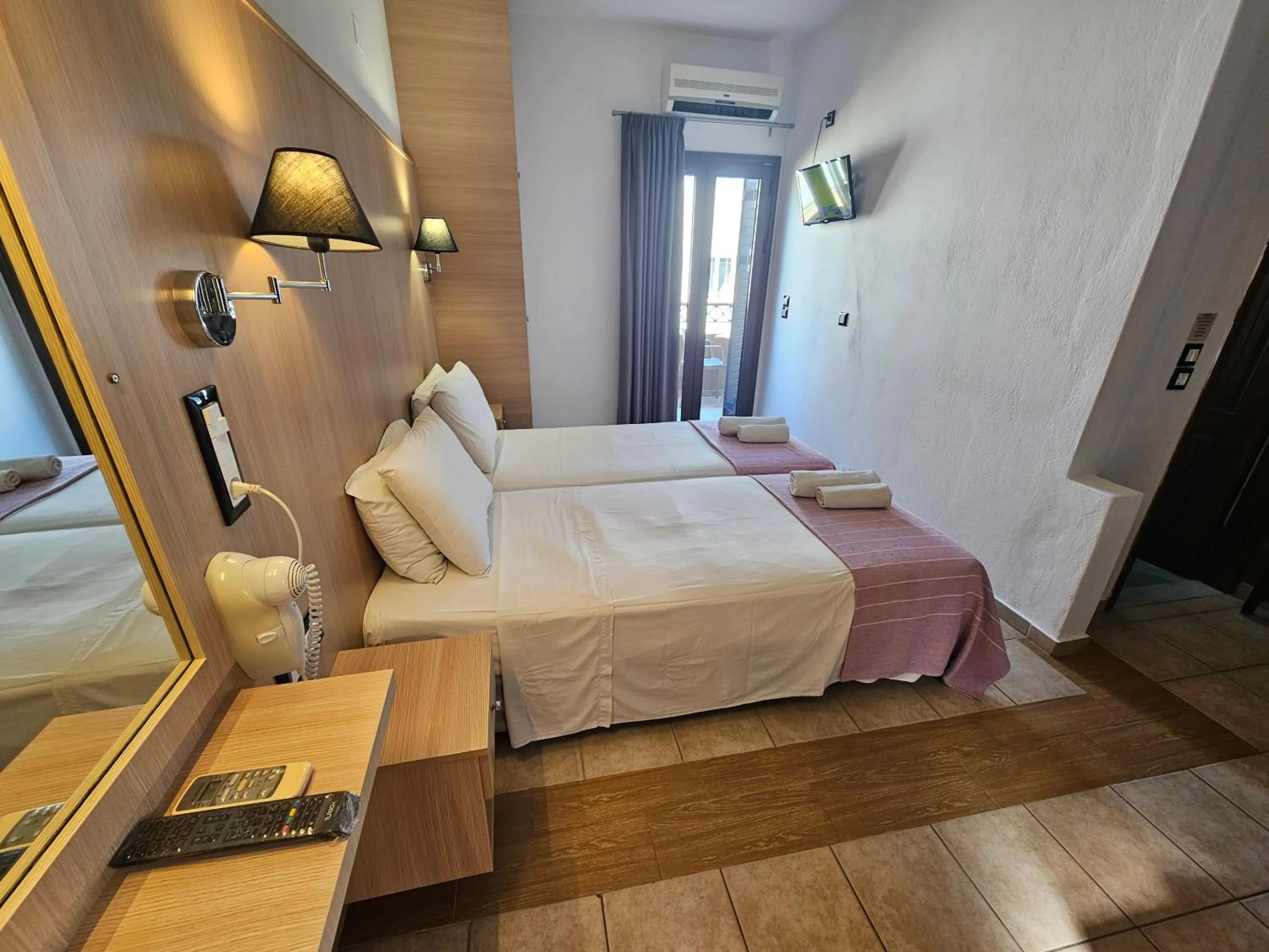 Bed in Elounda Sunrise Apartments