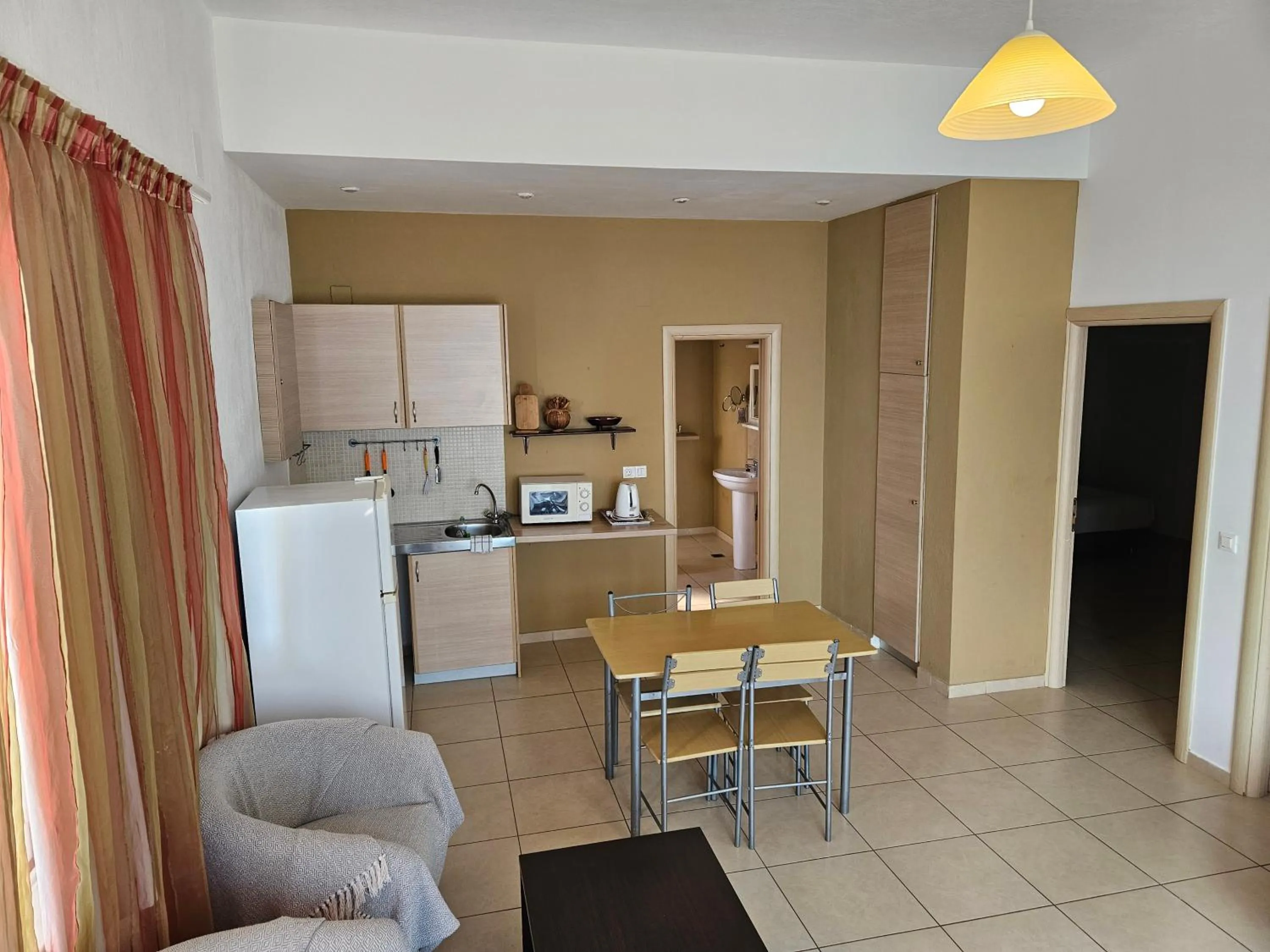 Kitchen or kitchenette in Elounda Sunrise Apartments