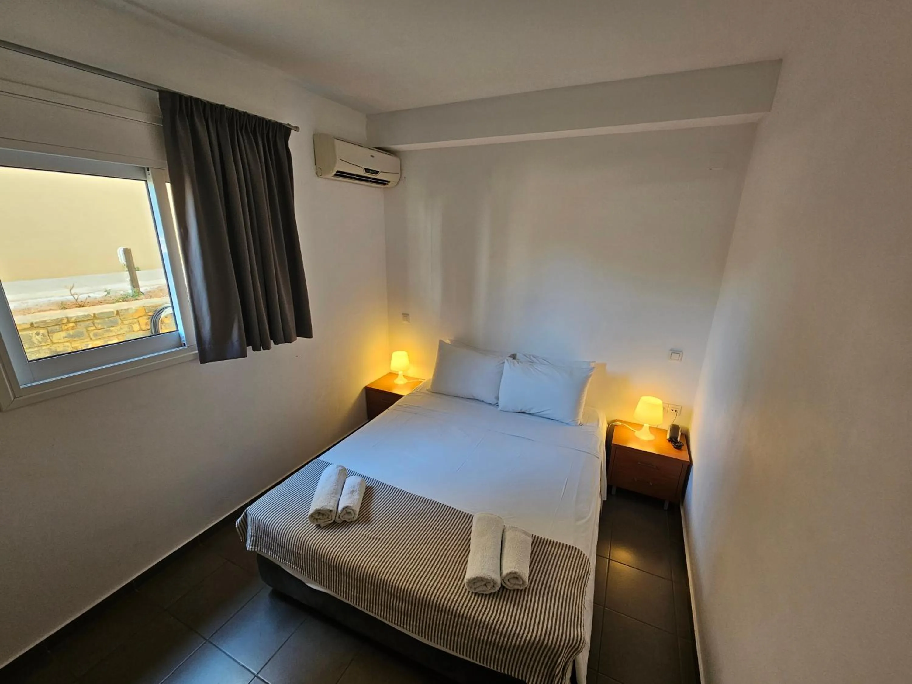 Bedroom, Bed in Elounda Sunrise Apartments