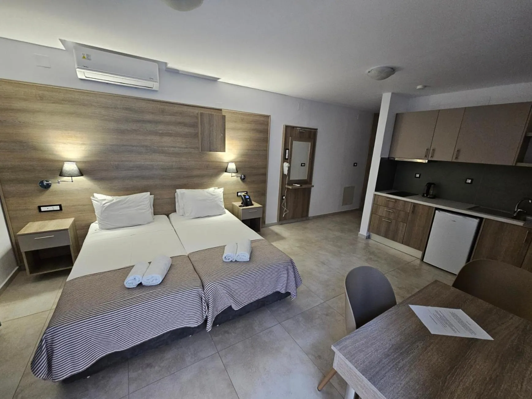 Bed in Elounda Sunrise Apartments