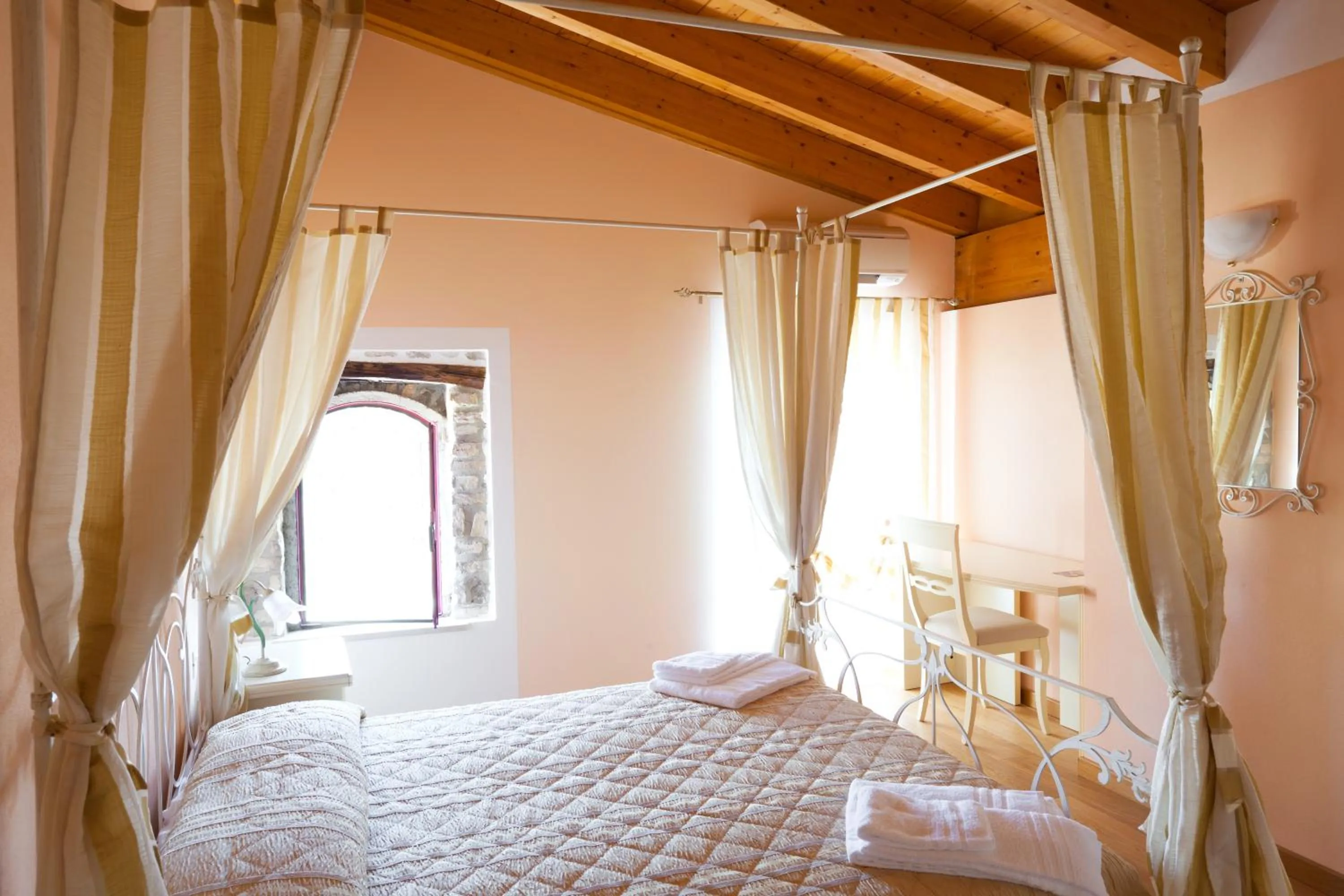 Bedroom, Bed in Barchi Resort - Apartments & Suites