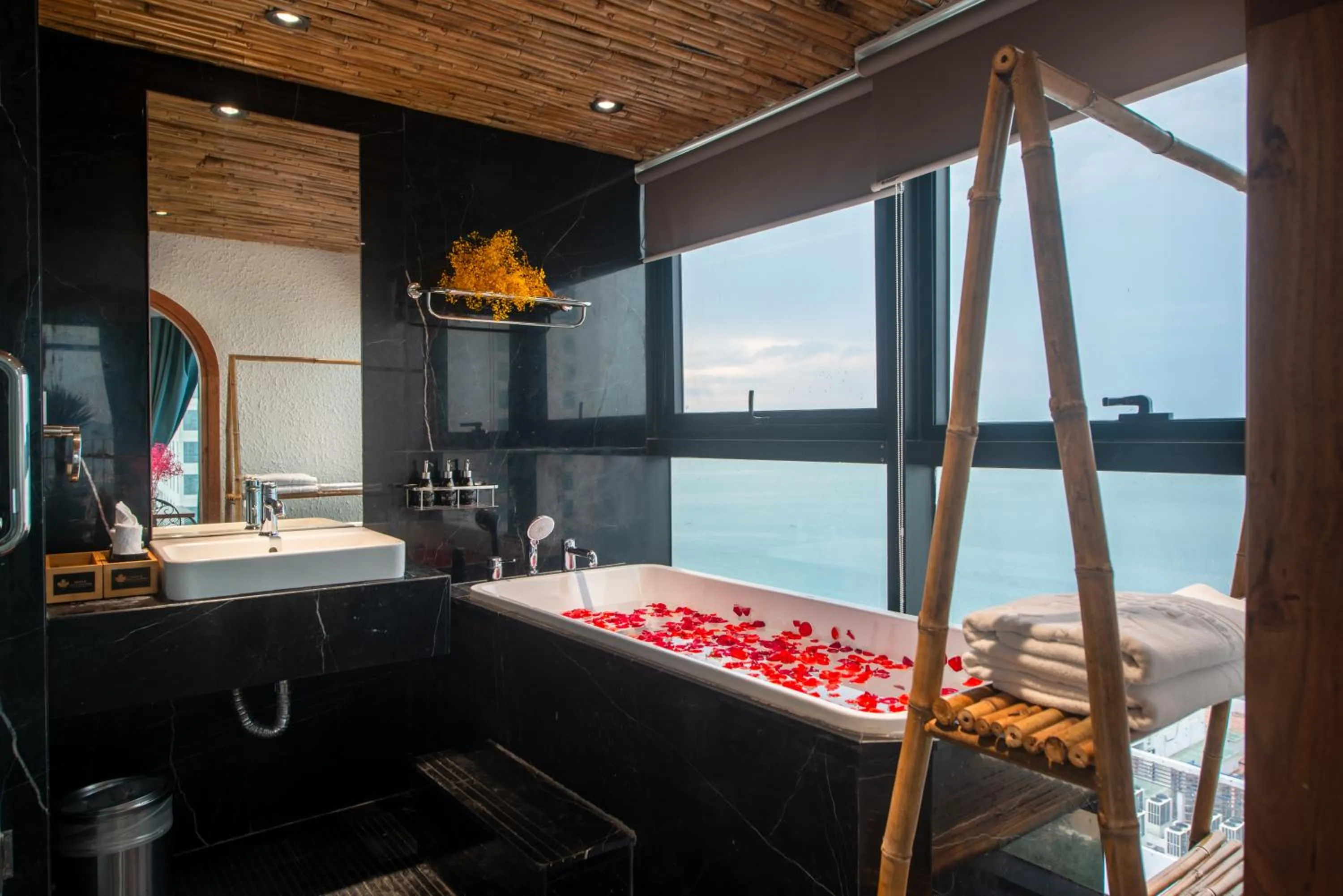 Bathroom in Maple Hotel & Apartment