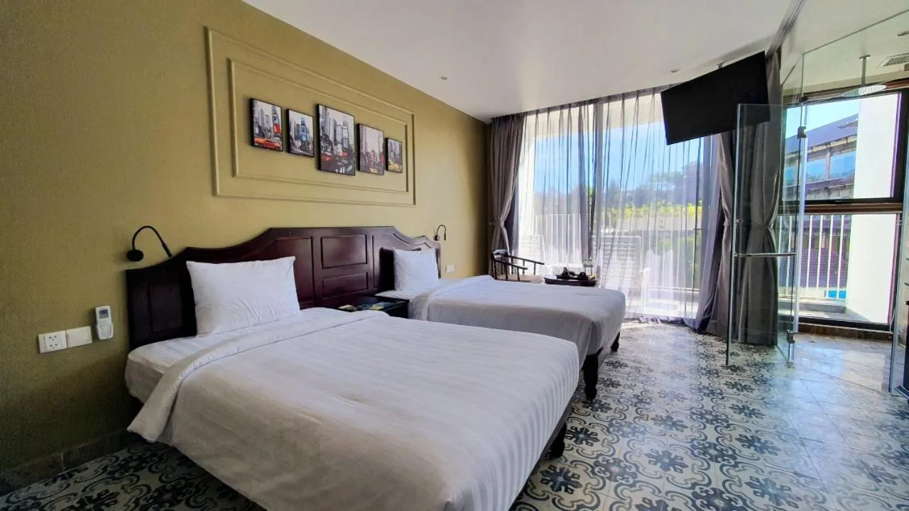 Bed in The Palmy Phu Quoc Resort & Spa