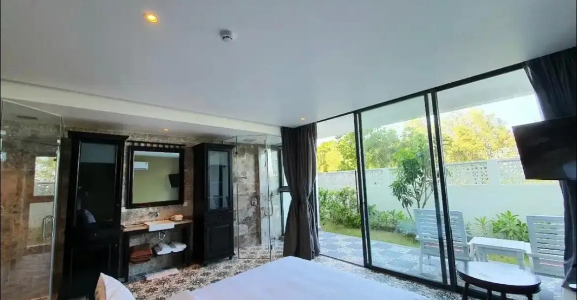 Bed in The Palmy Phu Quoc Resort & Spa